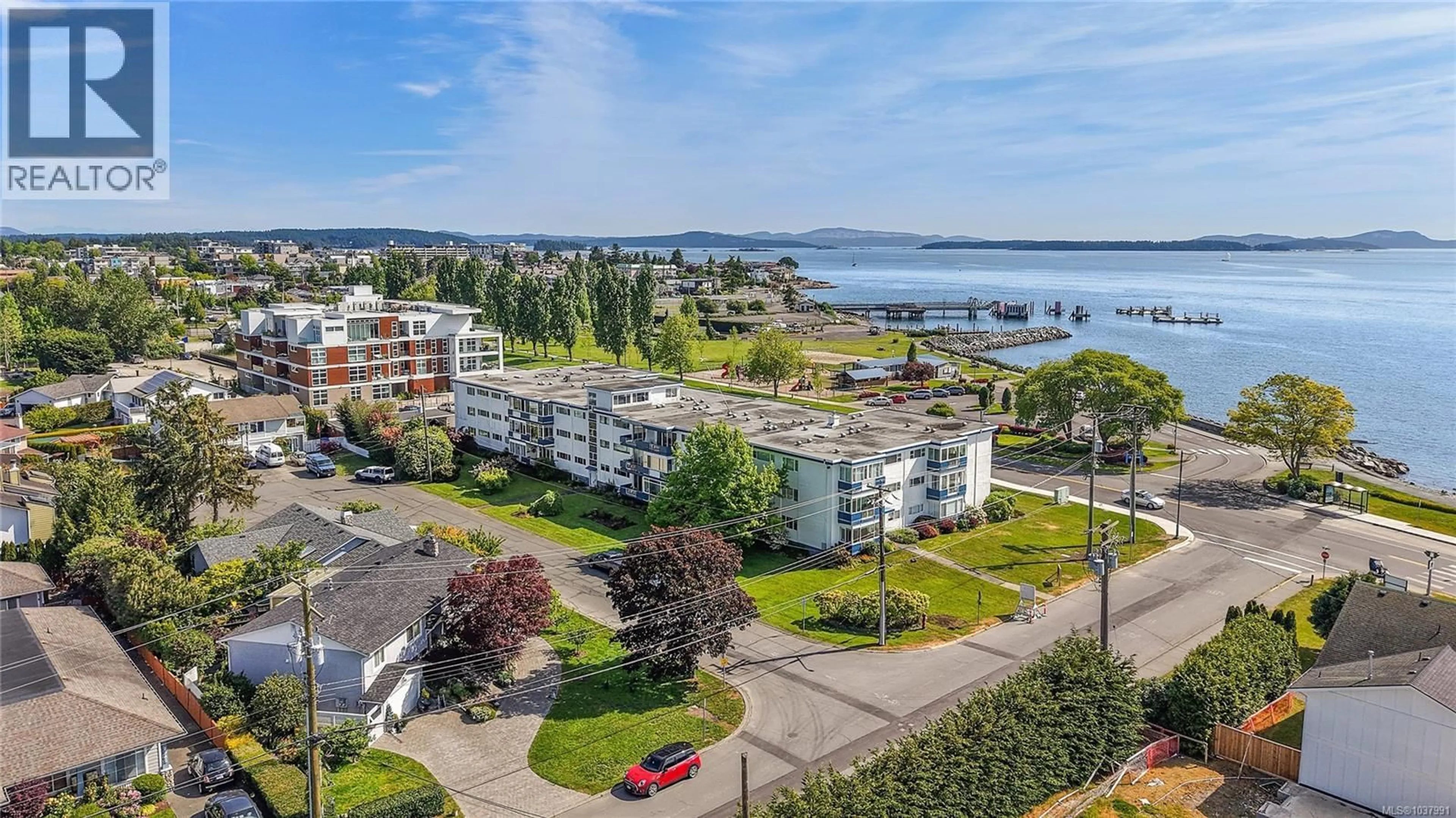 A pic from outside/outdoor area/front of a property/back of a property/a pic from drone, water/lake/river/ocean view for 111 - 9560 FIFTH STREET, Sidney British Columbia V8L2W5