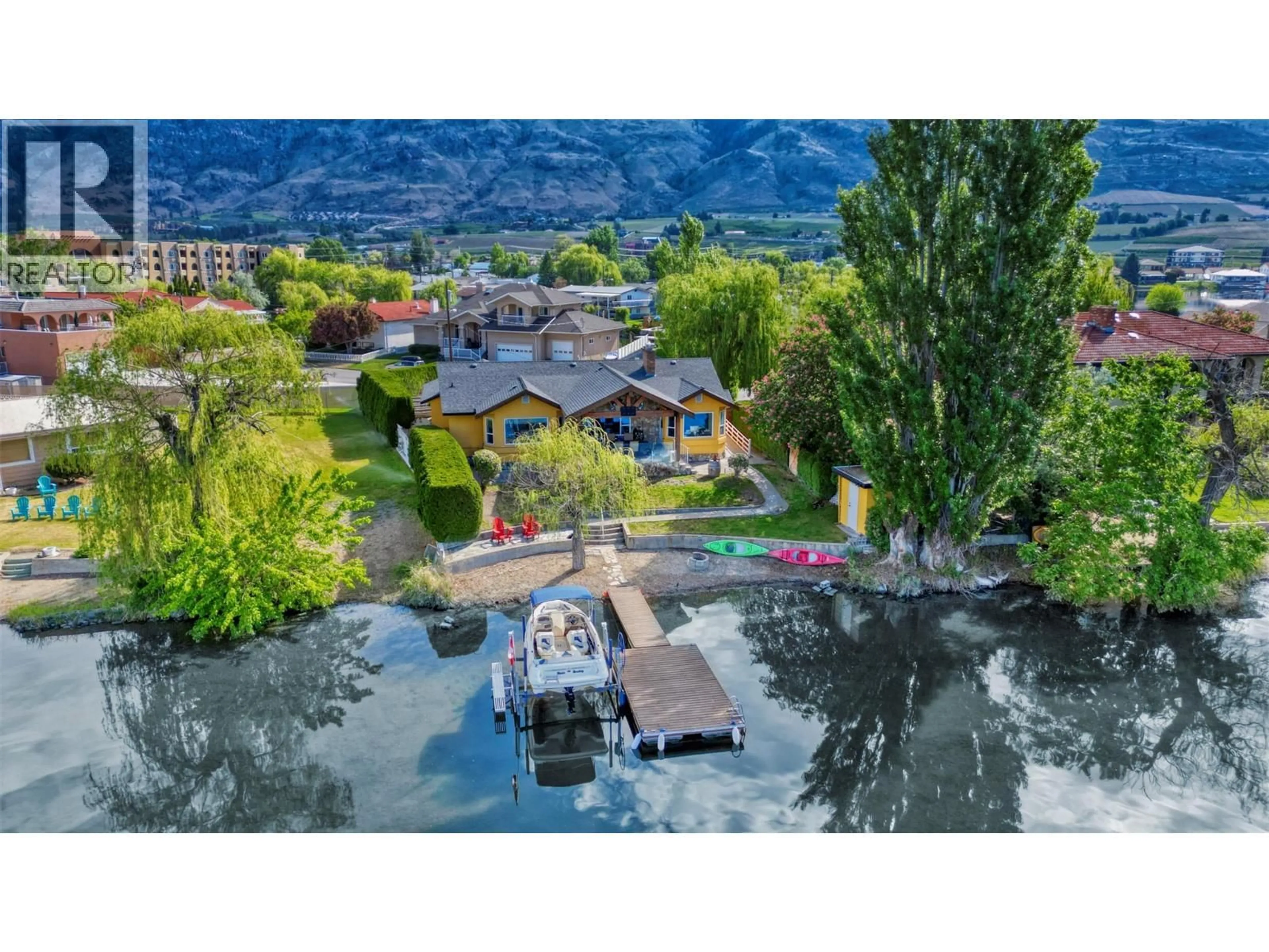 A pic from outside/outdoor area/front of a property/back of a property/a pic from drone, mountain view for 45 HARBOUR KEY DRIVE, Osoyoos British Columbia V0H1V3
