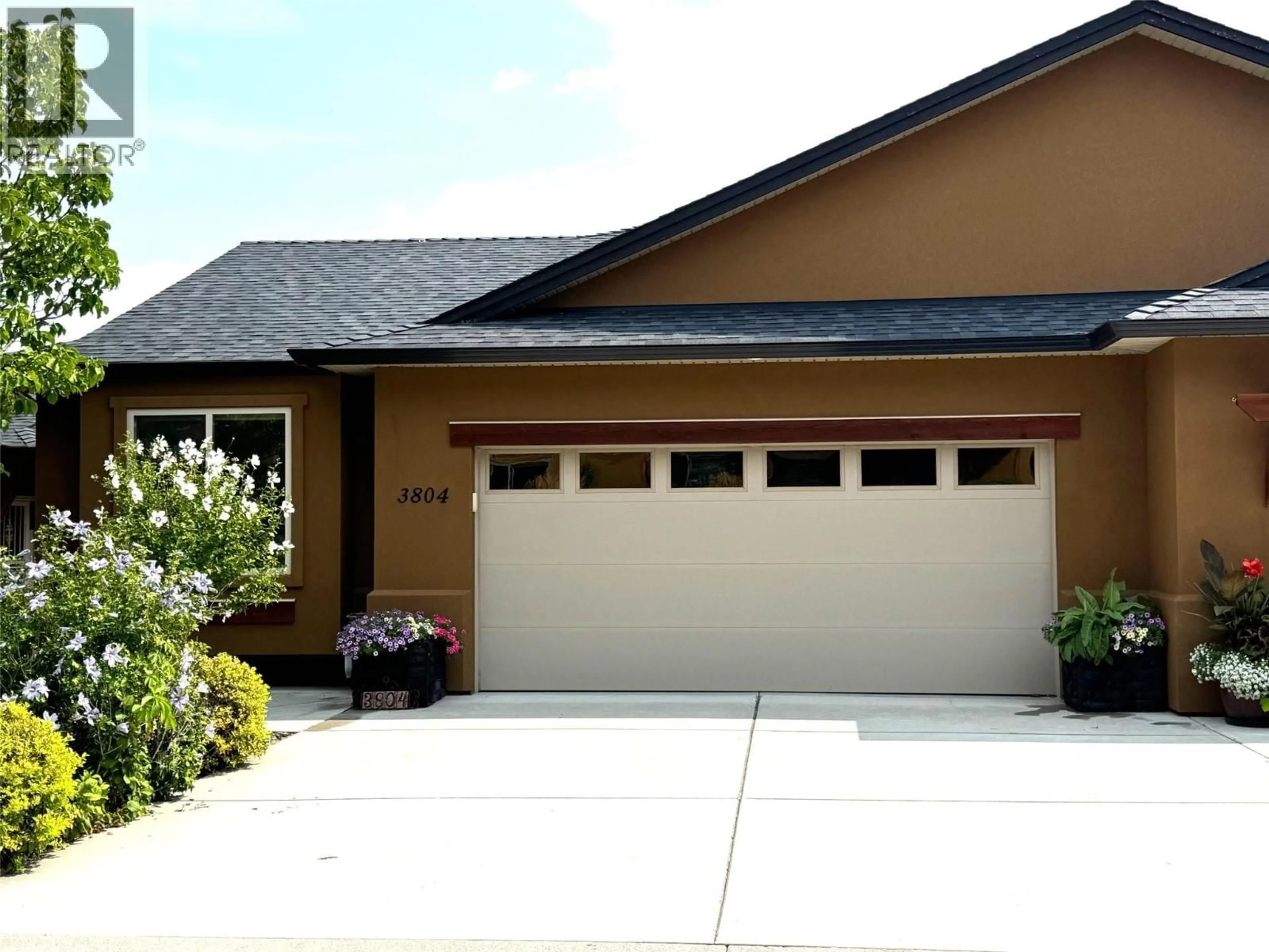 Home with vinyl exterior material, street for 3804 SIRINGO LANE, Westbank British Columbia V4T3G4