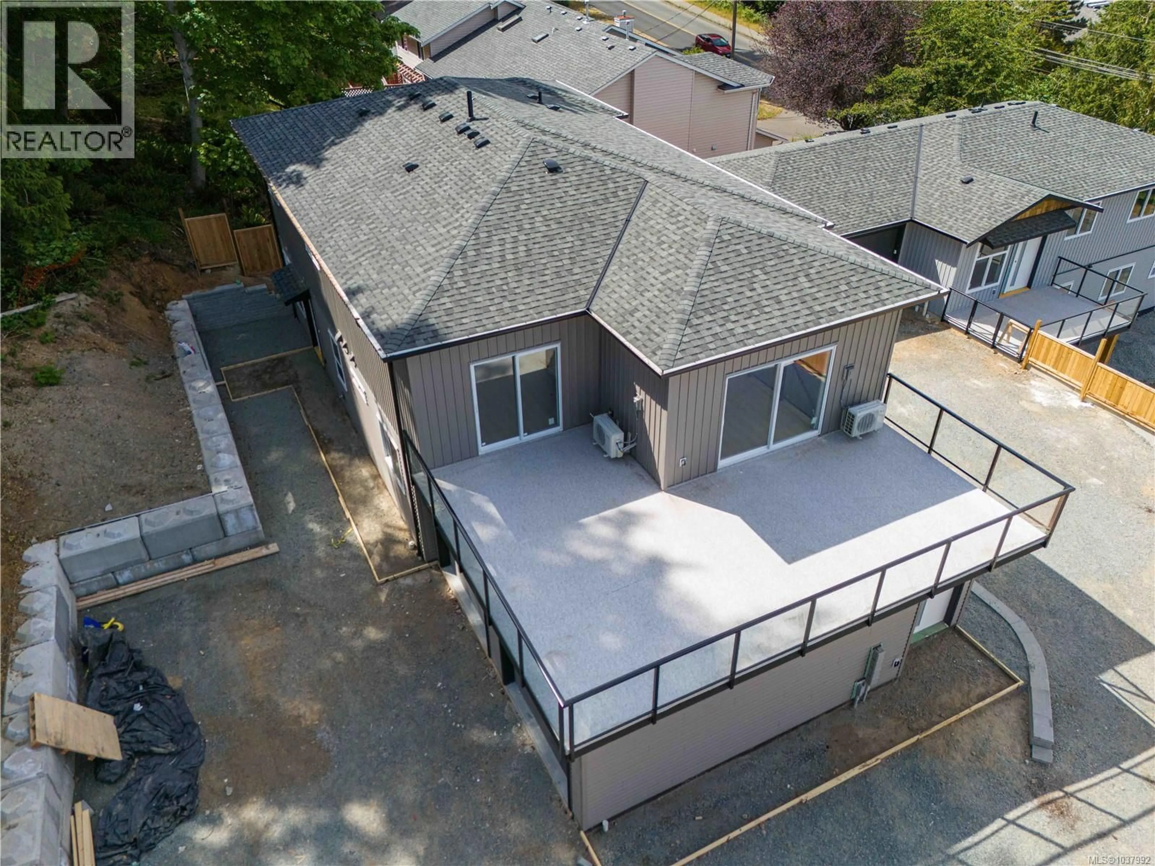 A pic from outside/outdoor area/front of a property/back of a property/a pic from drone, street for 201 - 5309 TOMS TURNABOUT, Nanaimo British Columbia V9T5M9