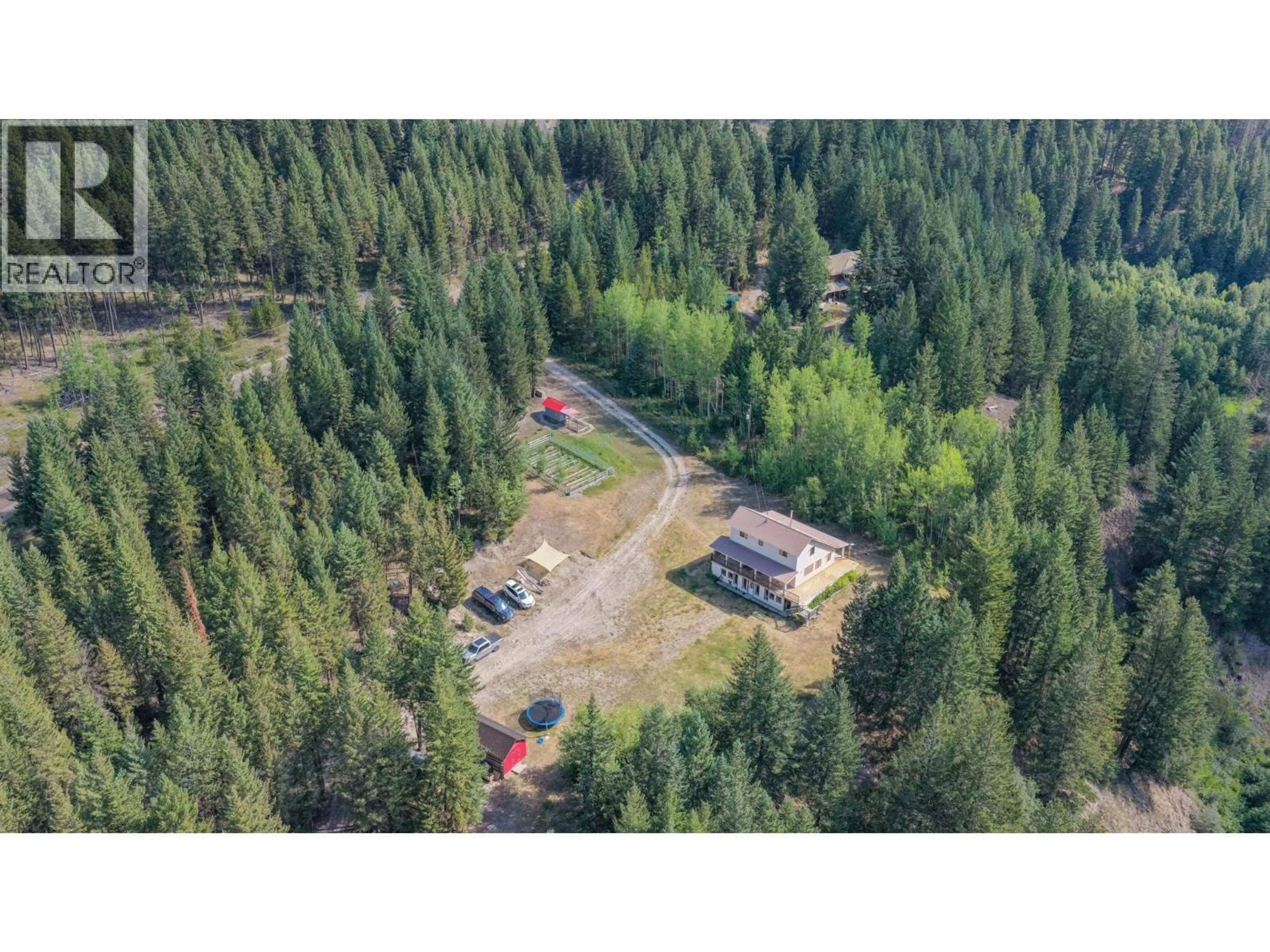 A pic from outside/outdoor area/front of a property/back of a property/a pic from drone, forest/trees view for 7250 CHINA VALLEY ROAD, Falkland British Columbia V0E1W1