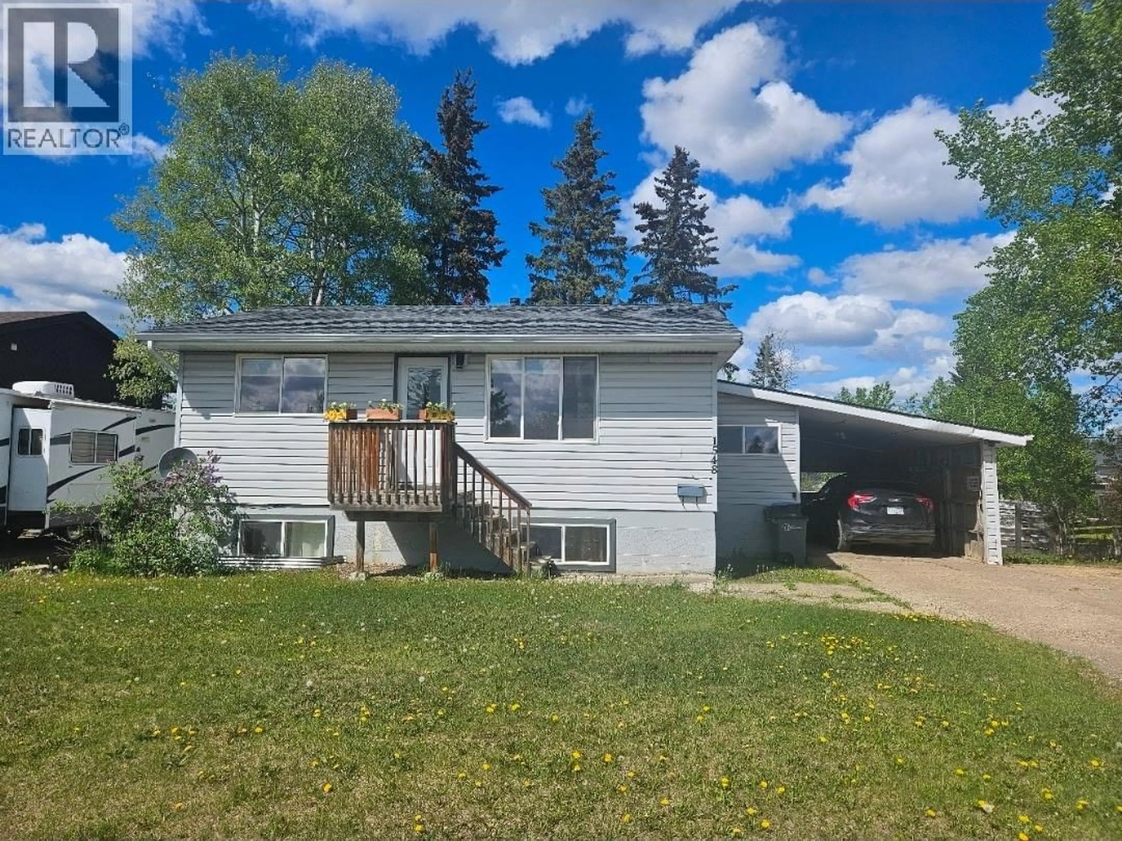 A pic from outside/outdoor area/front of a property/back of a property/a pic from drone, unknown for 1548 110 AVENUE, Dawson Creek British Columbia V1G2W2