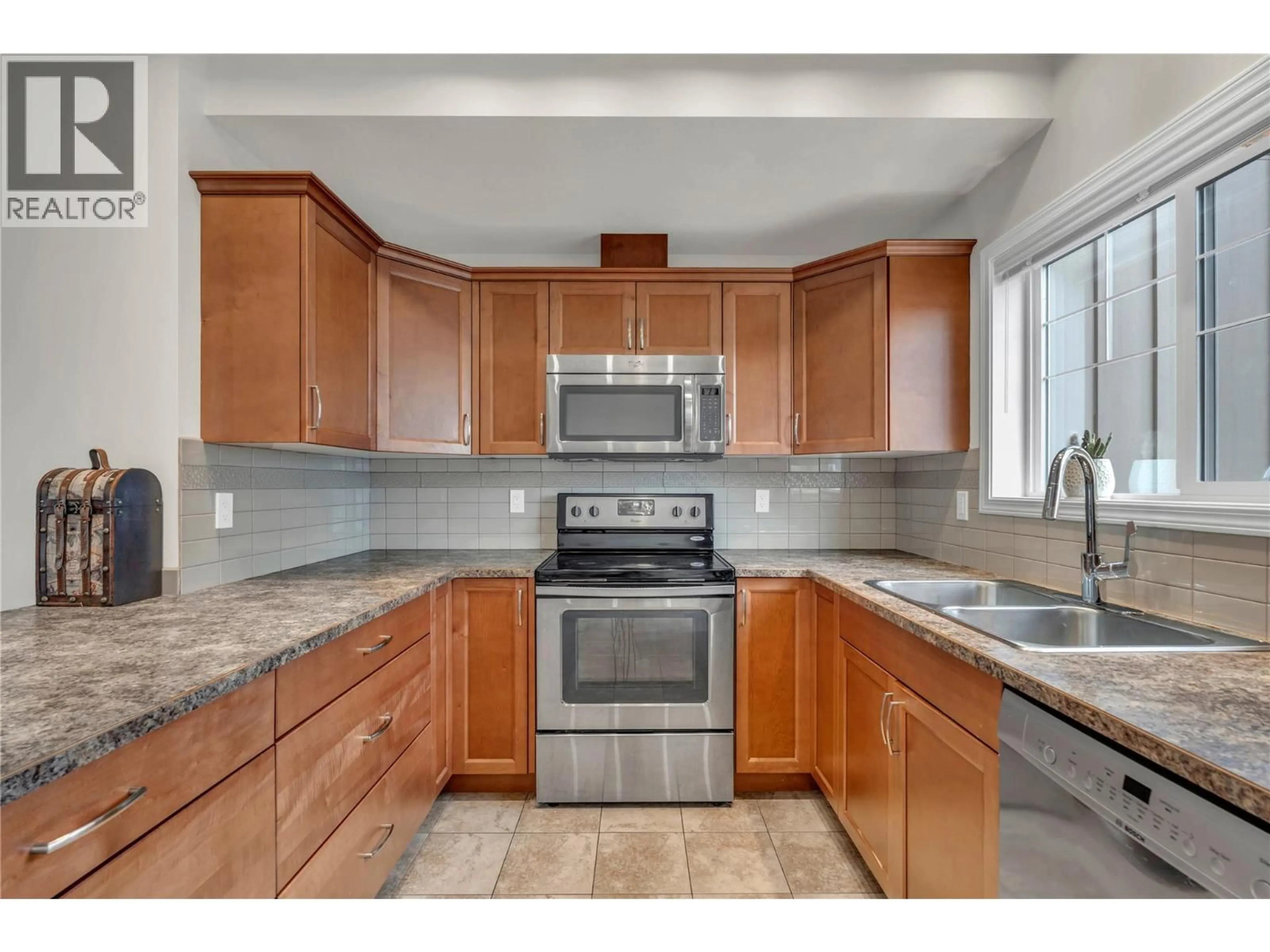 Standard kitchen, ceramic/tile floor for 106 - 3363 WILSON STREET, Penticton British Columbia V2A9G7