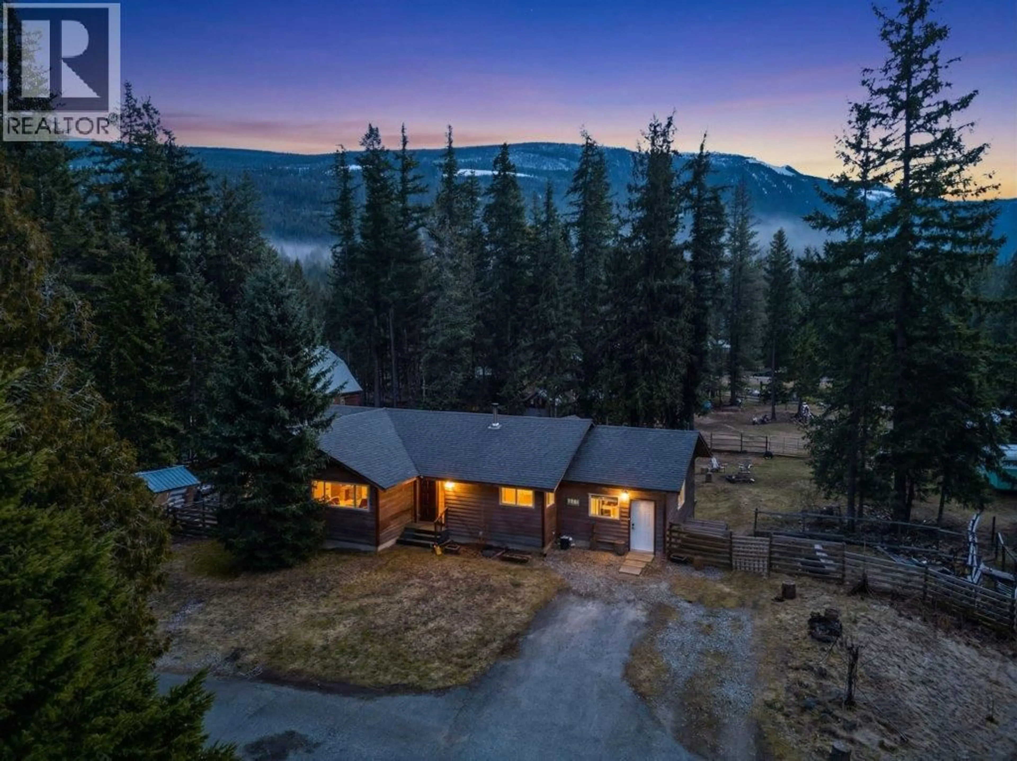 A pic from outside/outdoor area/front of a property/back of a property/a pic from drone, mountain view for 4198 MALAKWA ROAD, Malakwa British Columbia V0E2J0