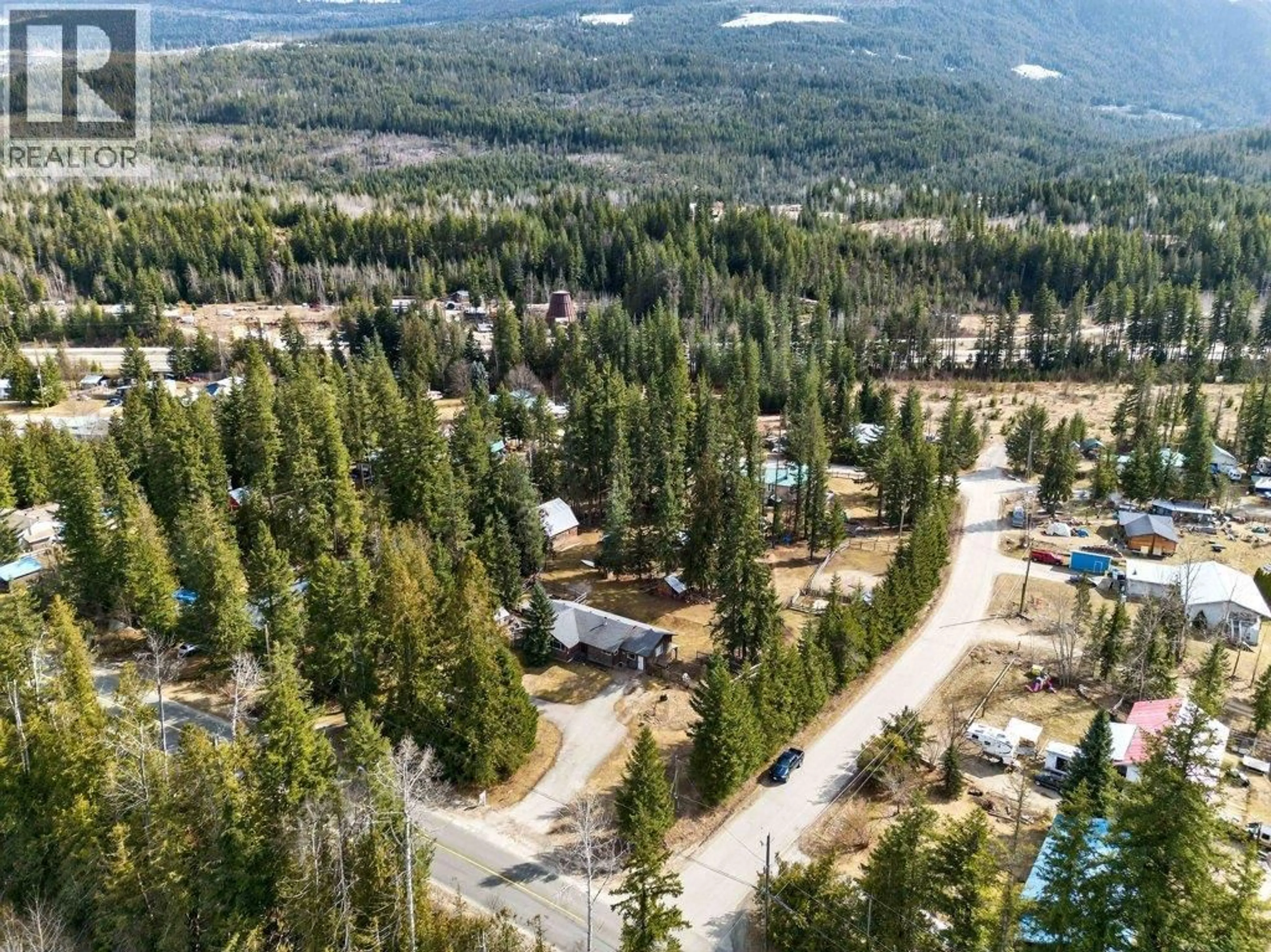 A pic from outside/outdoor area/front of a property/back of a property/a pic from drone, mountain view for 4198 MALAKWA ROAD, Malakwa British Columbia V0E2J0