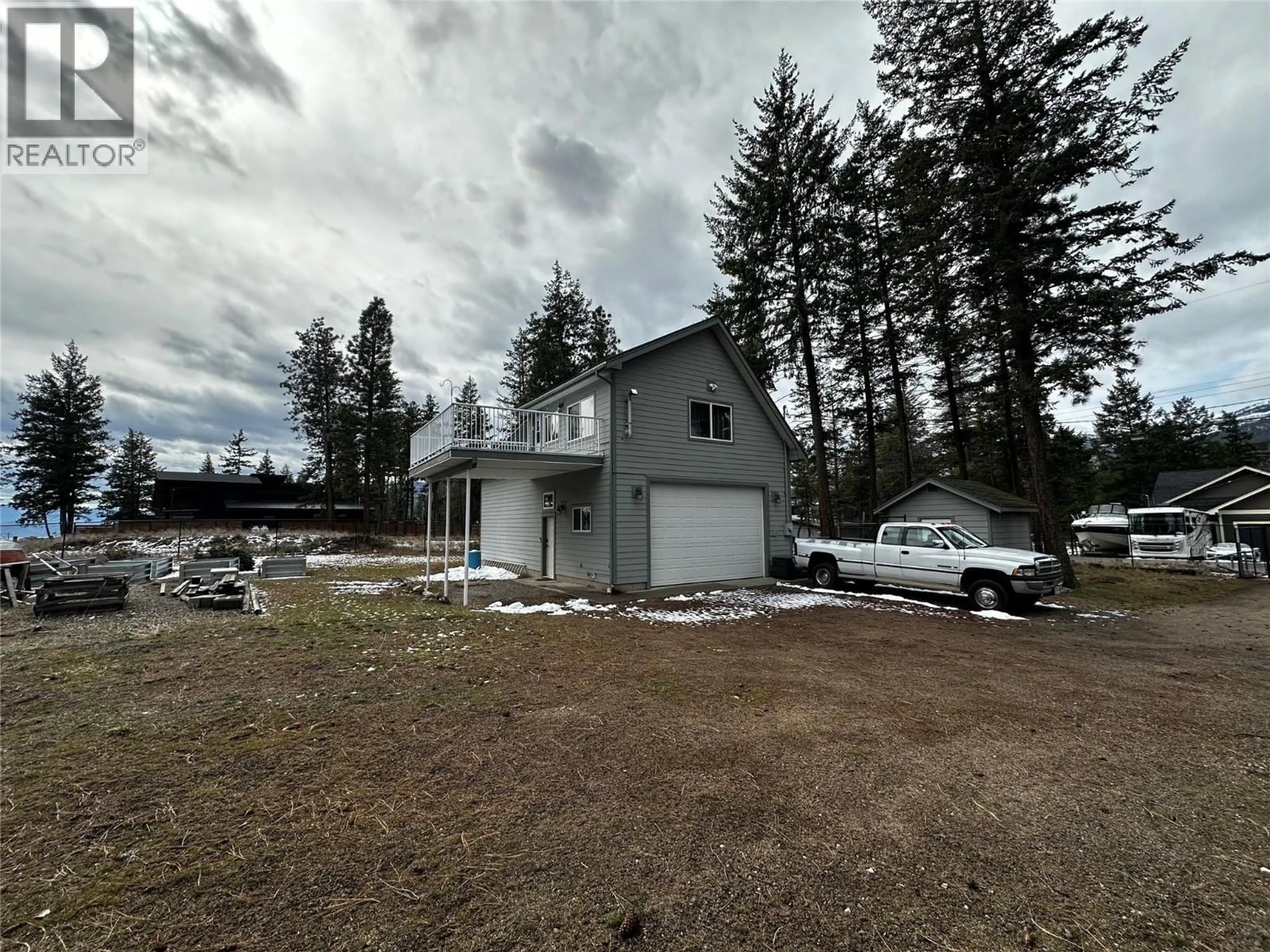 A pic from outside/outdoor area/front of a property/back of a property/a pic from drone, unknown for 7245 DUNWATERS ROAD, Kelowna British Columbia V1Z3W4