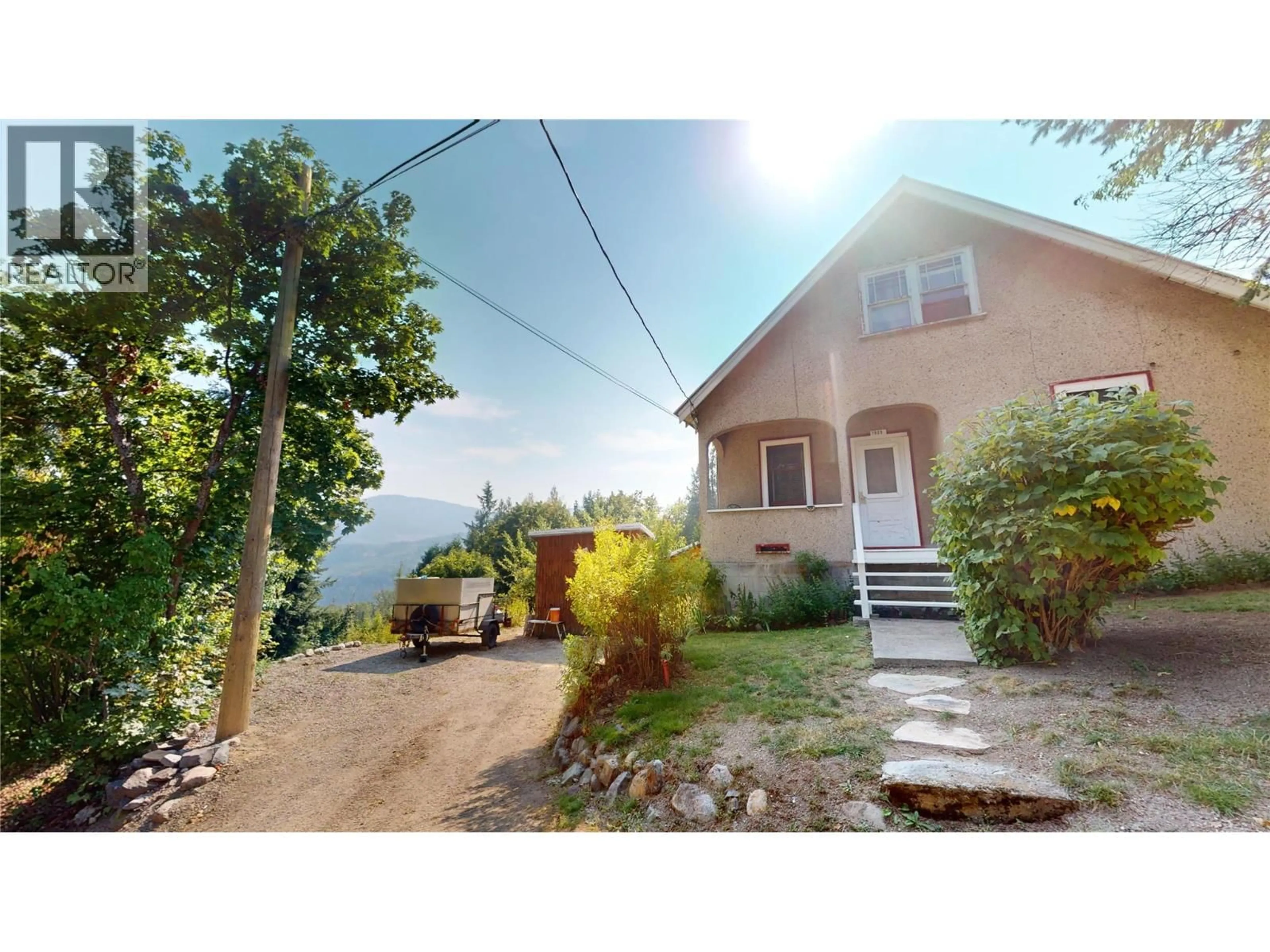 A pic from outside/outdoor area/front of a property/back of a property/a pic from drone, mountain view for 1929 UNION AVENUE, Rossland British Columbia V0G1Y0