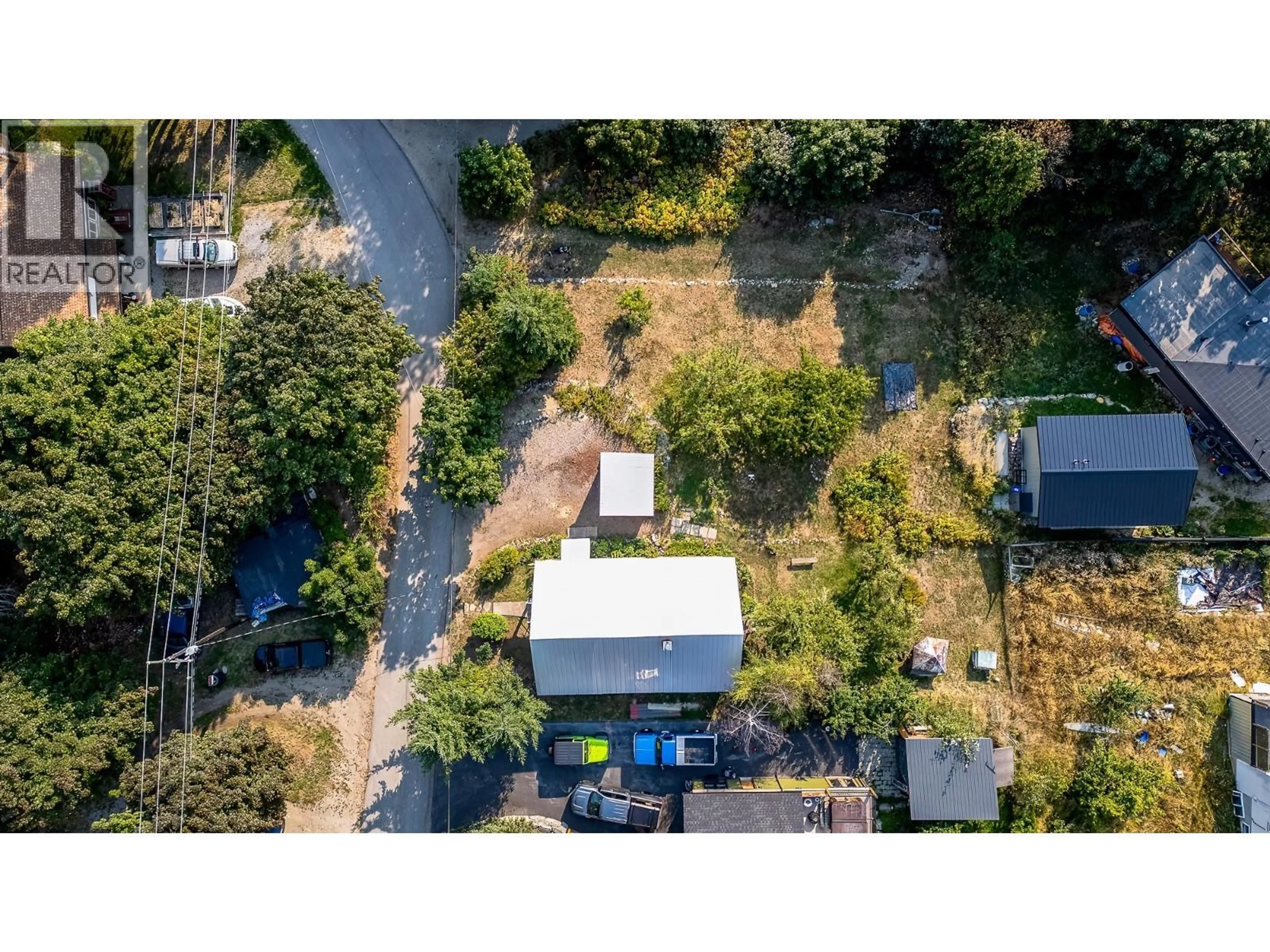 A pic from outside/outdoor area/front of a property/back of a property/a pic from drone, street for 1929 UNION AVENUE, Rossland British Columbia V0G1Y0
