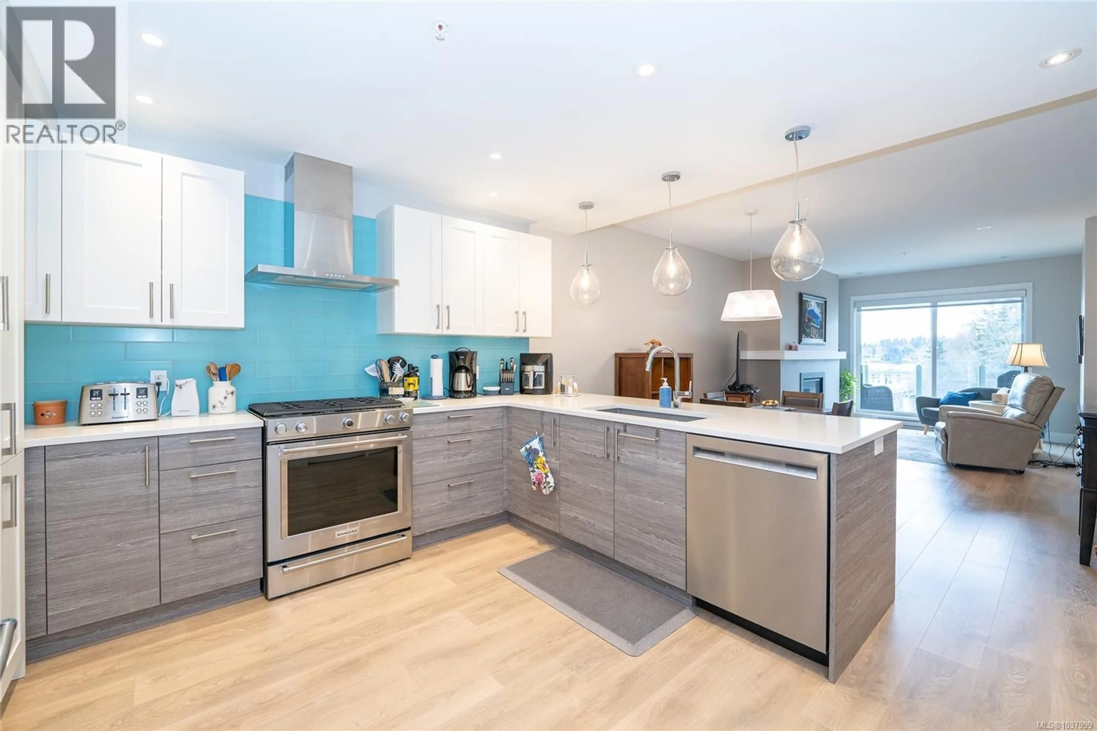Contemporary kitchen, wood/laminate floor for 207 - 1820 MAPLE AVENUE SOUTH, Sooke British Columbia V9Z0N9