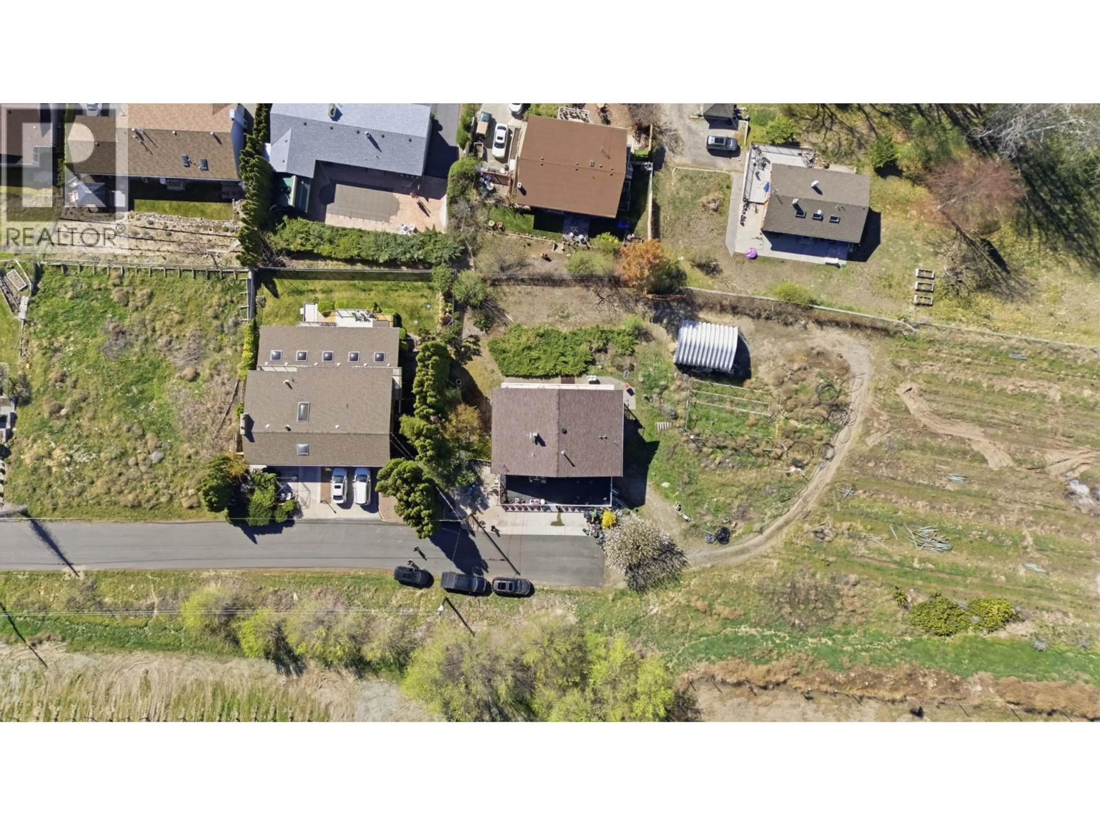 A pic from outside/outdoor area/front of a property/back of a property/a pic from drone, street for 4616 37TH STREET, Osoyoos British Columbia V0H1V6