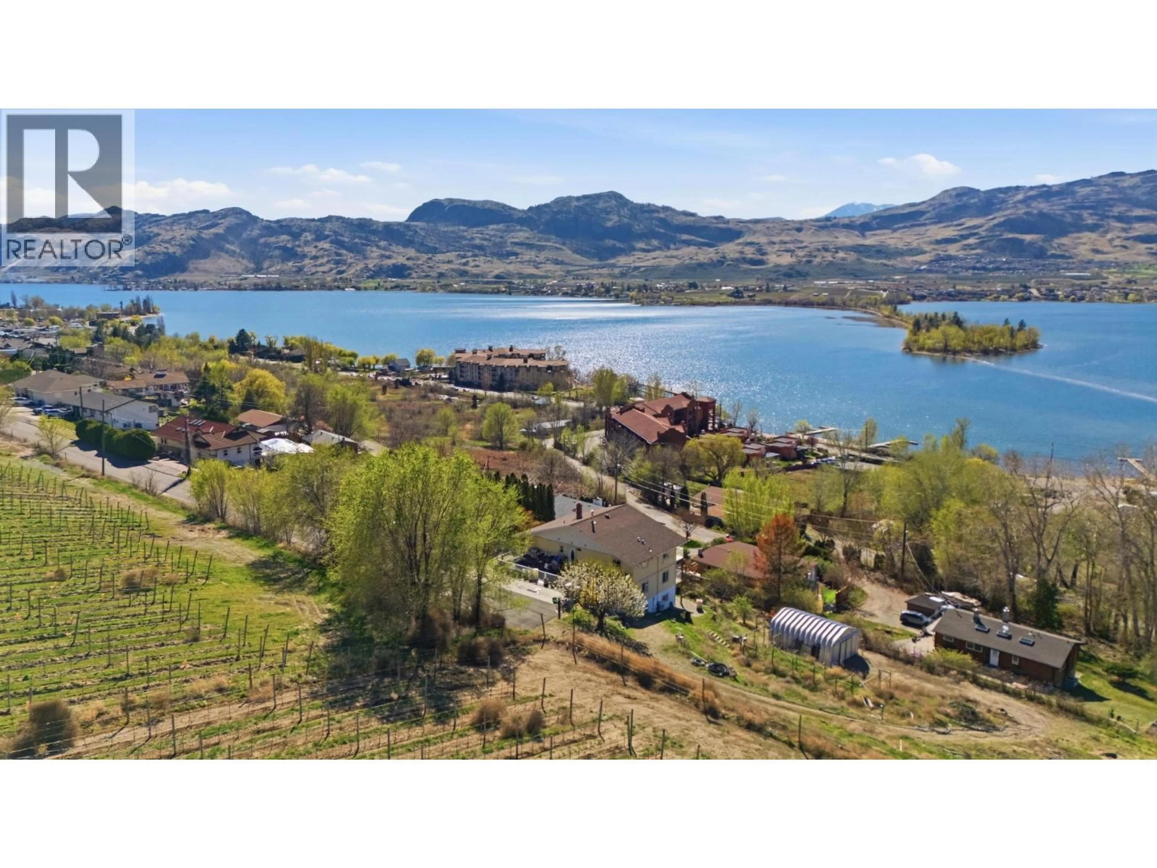 A pic from outside/outdoor area/front of a property/back of a property/a pic from drone, water/lake/river/ocean view for 4616 37TH STREET, Osoyoos British Columbia V0H1V6
