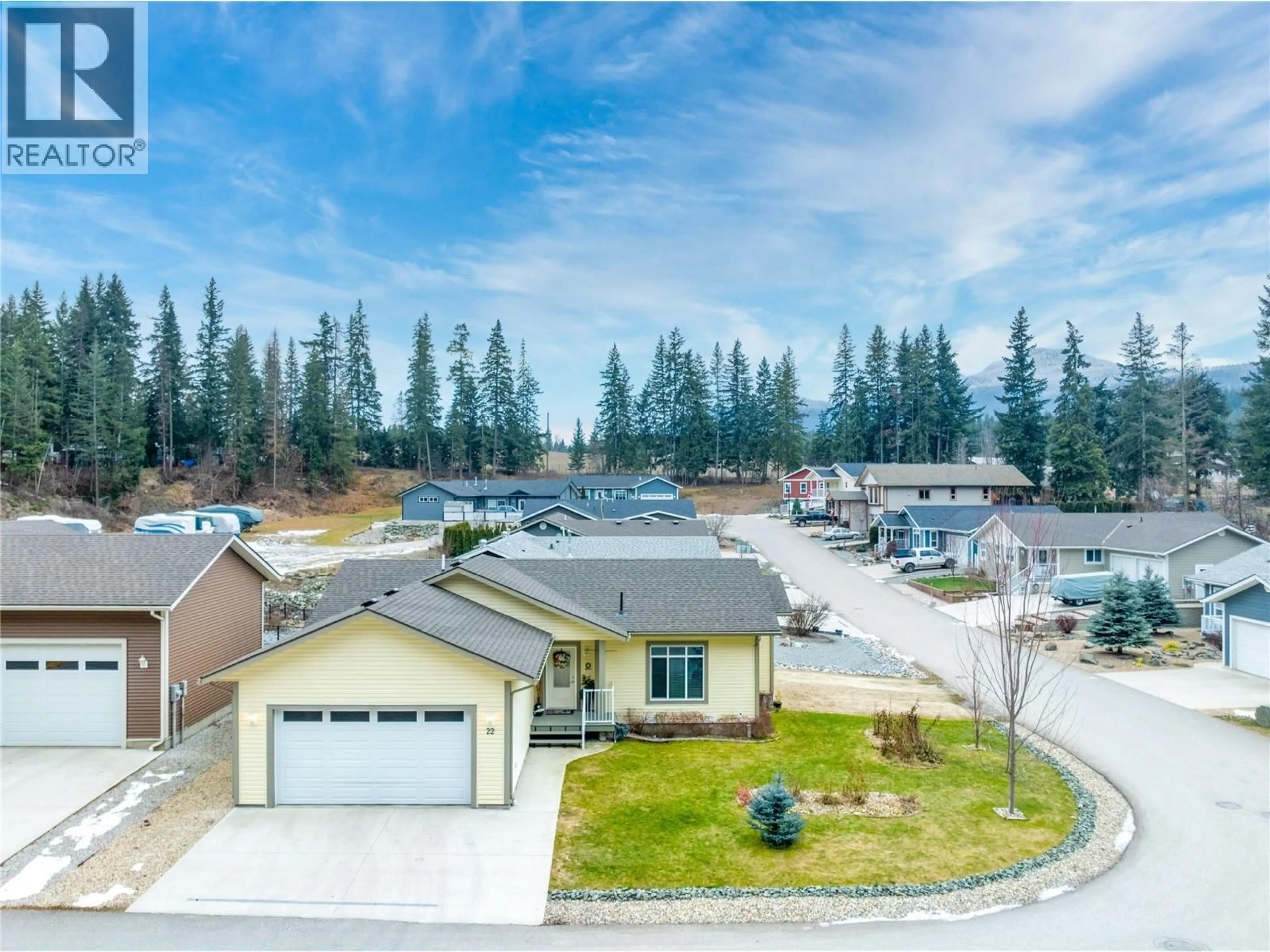 A pic from outside/outdoor area/front of a property/back of a property/a pic from drone, street for 22 - 481 97B HIGHWAY NORTHEAST, Salmon Arm British Columbia V1E1X5