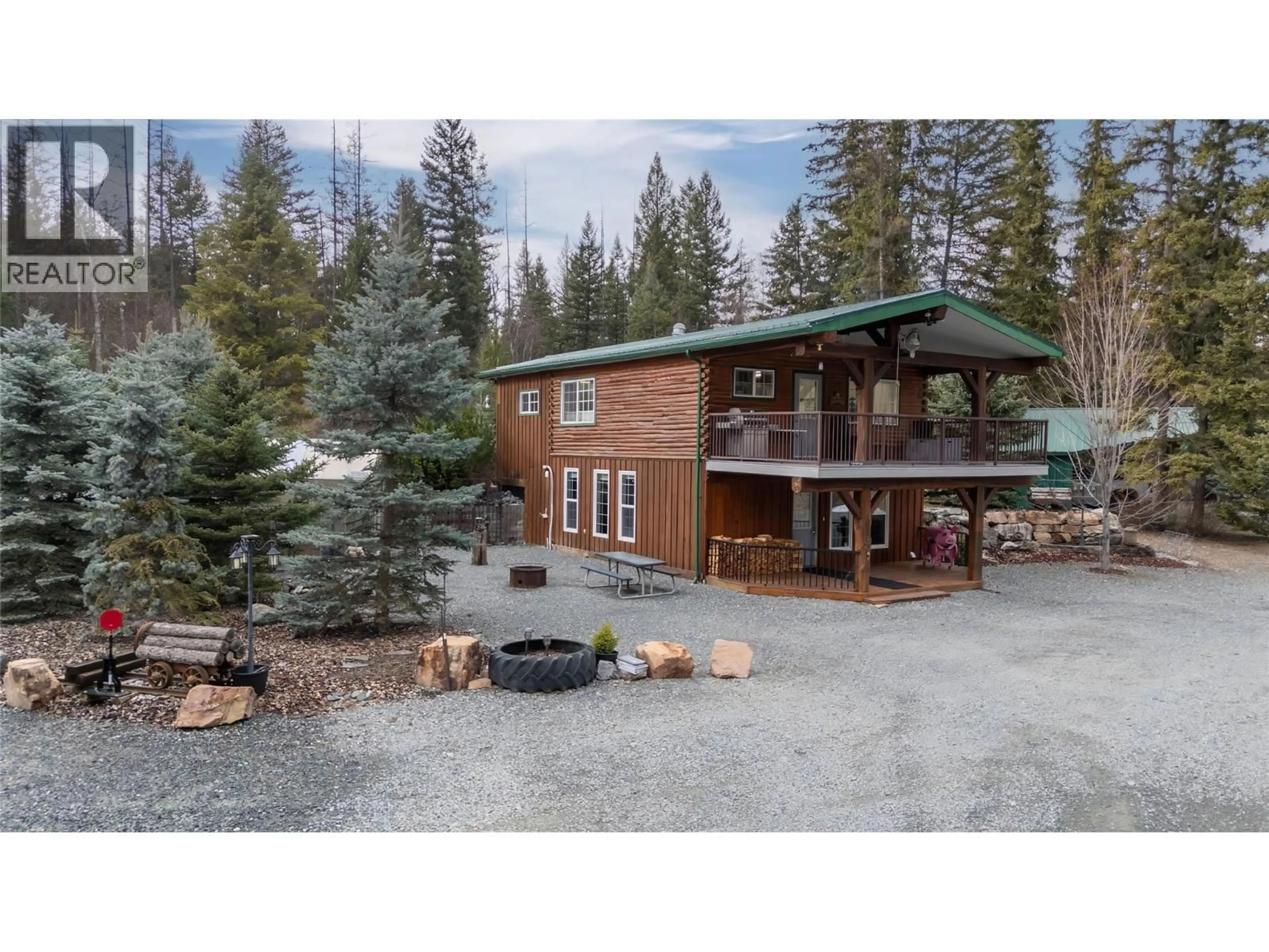 A pic from outside/outdoor area/front of a property/back of a property/a pic from drone, mountain view for 6206 TIE LAKE SHORE N ROAD, Jaffray British Columbia V0B1T0