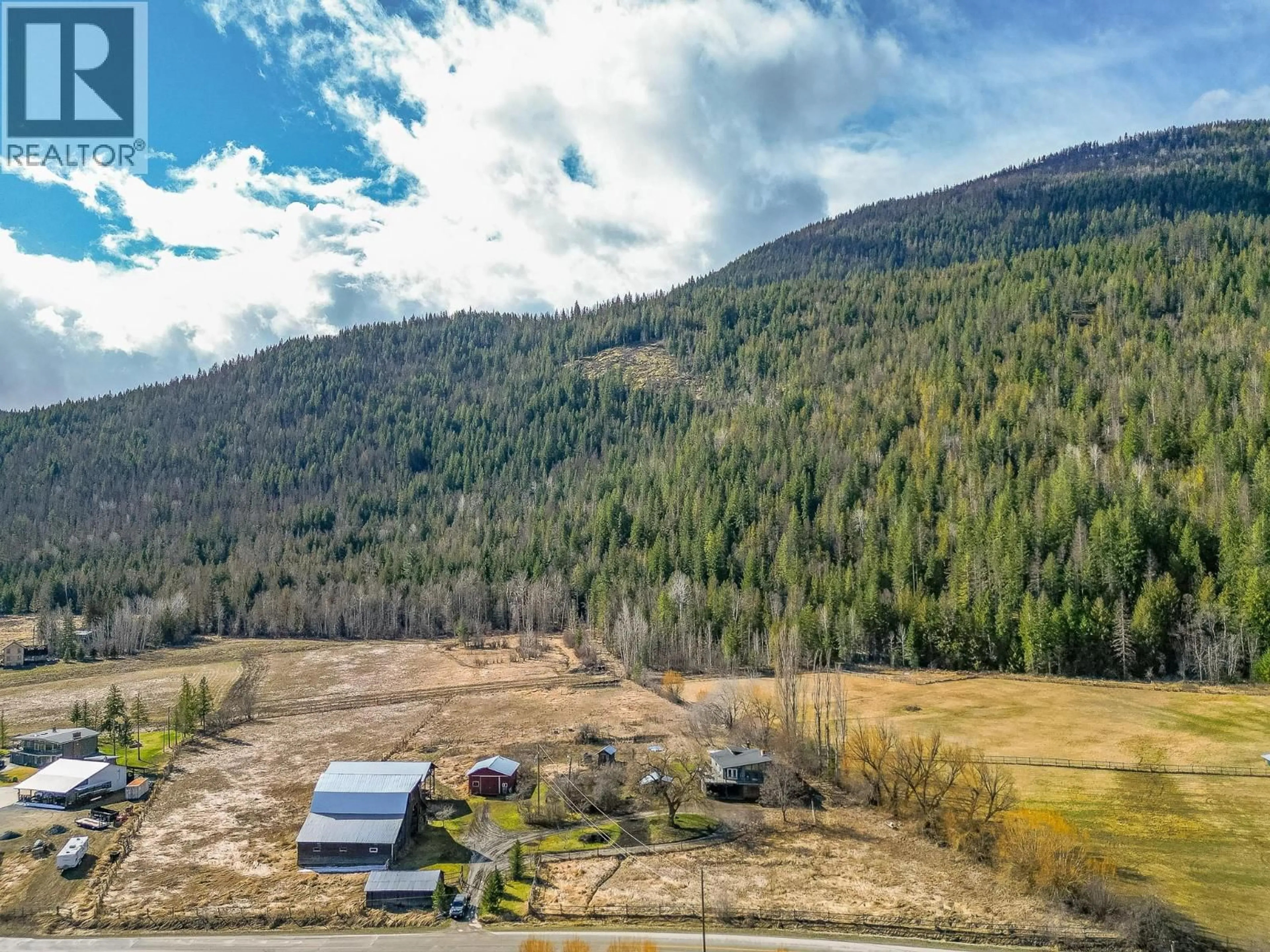 A pic from outside/outdoor area/front of a property/back of a property/a pic from drone, mountain view for 3668 TRINITY VALLEY ROAD, Enderby British Columbia V0E1V5