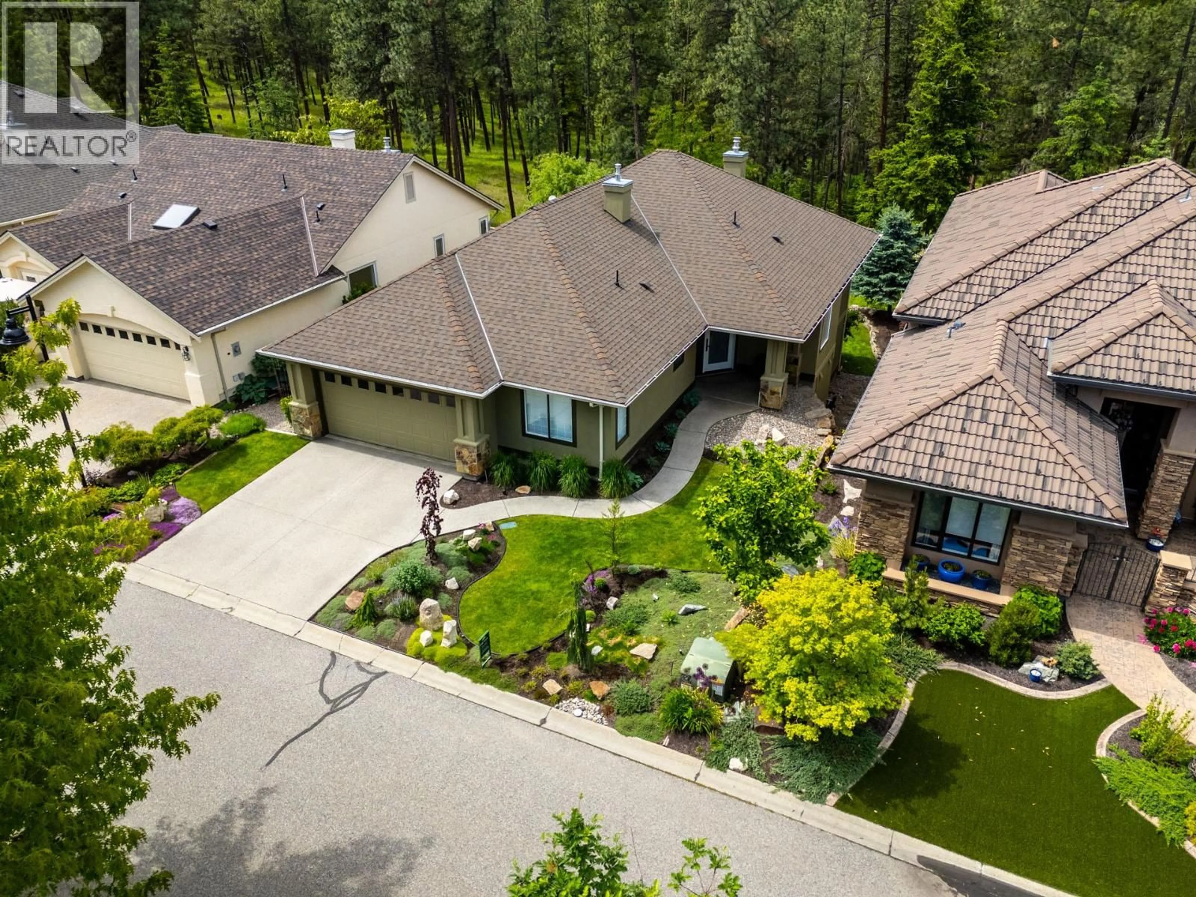 A pic from outside/outdoor area/front of a property/back of a property/a pic from drone, street for 4158 GALLAGHERS FOREST SOUTH, Kelowna British Columbia V1W5E4