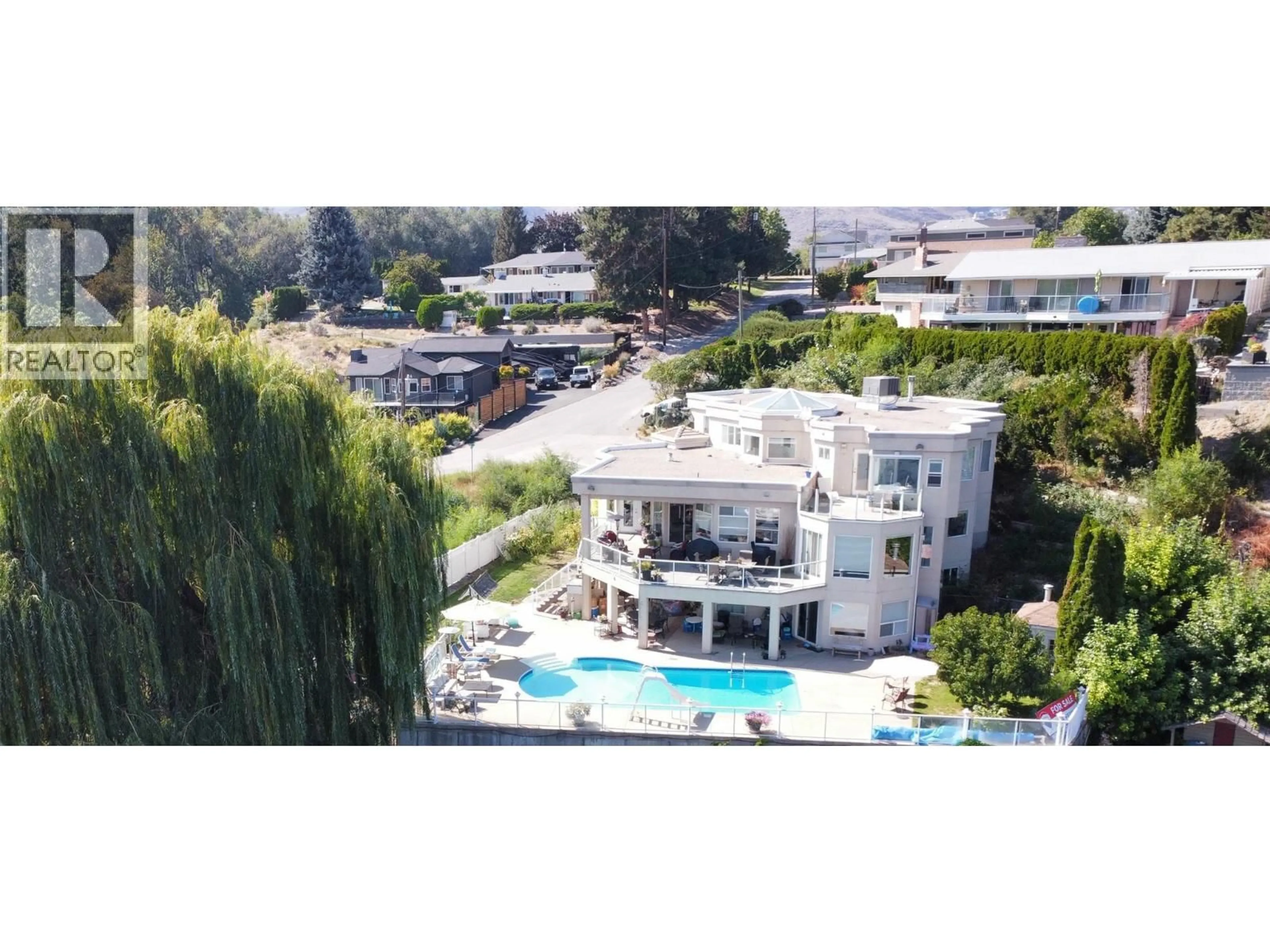 A pic from outside/outdoor area/front of a property/back of a property/a pic from drone, unknown for 8330 22ND AVENUE, Osoyoos British Columbia V0H1V1