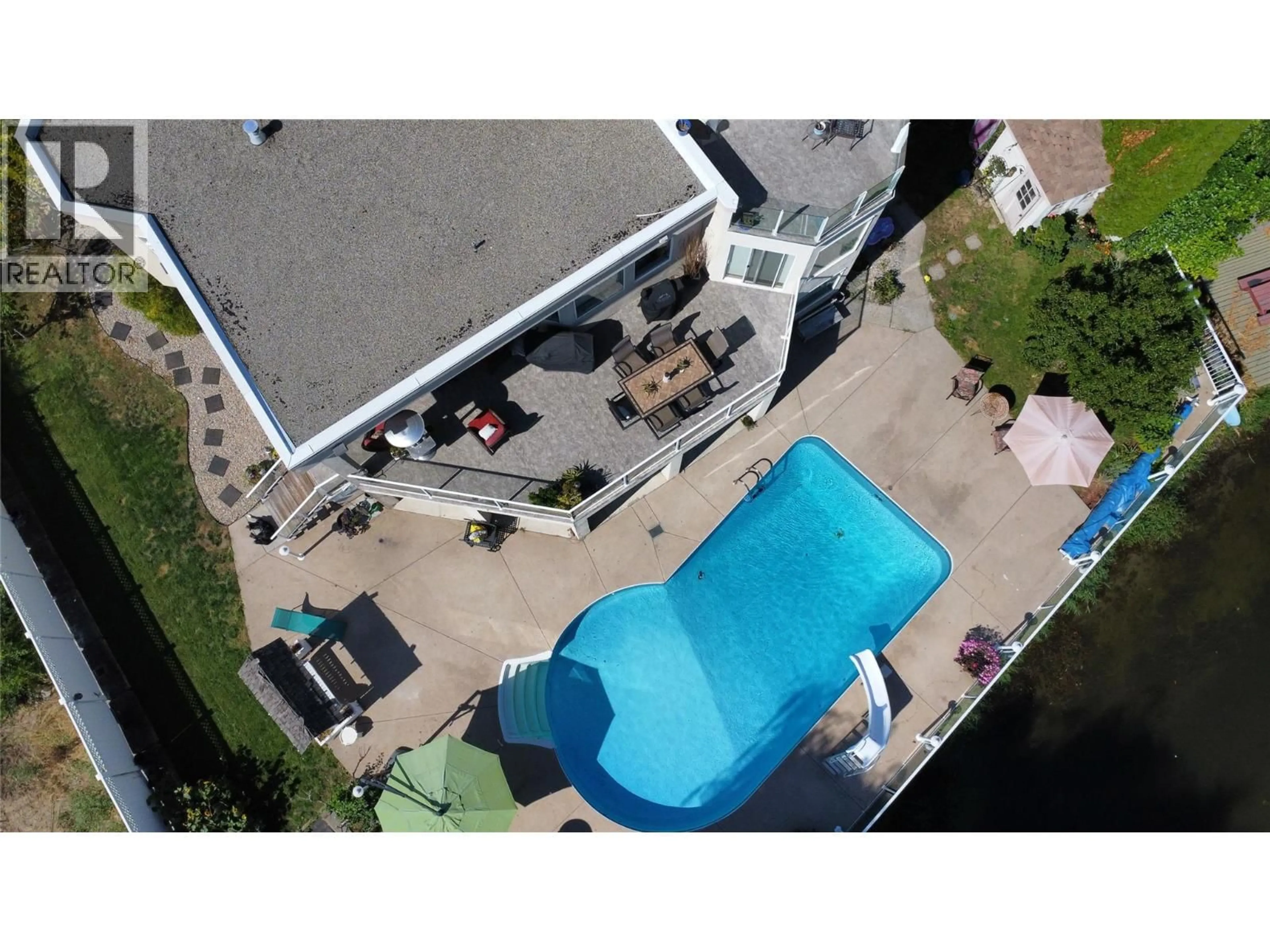 A pic from outside/outdoor area/front of a property/back of a property/a pic from drone, unknown for 8330 22ND AVENUE, Osoyoos British Columbia V0H1V1