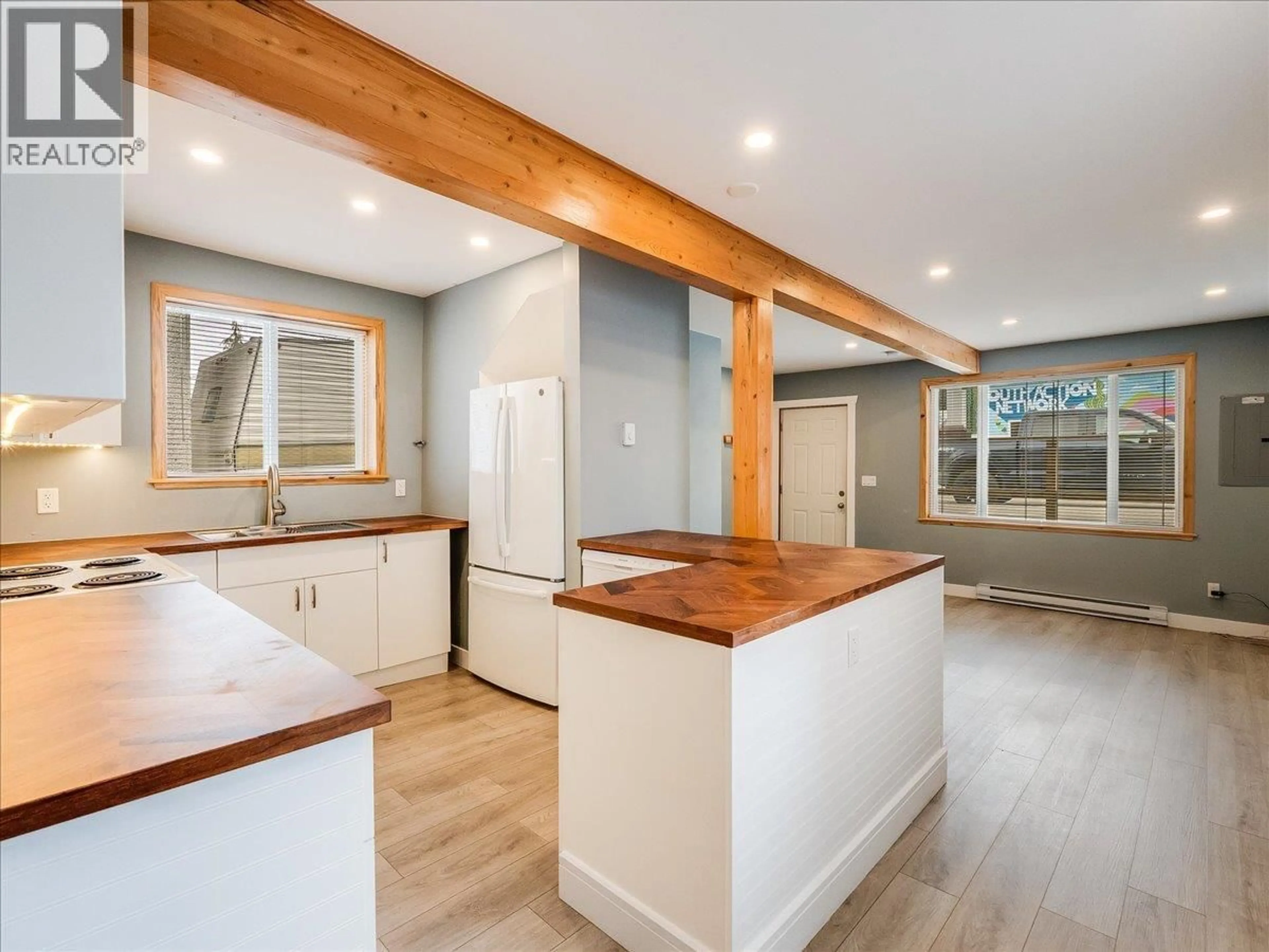 Open concept kitchen, wood/laminate floor for 2342 WASHINGTON STREET, Rossland British Columbia V0G1Y0