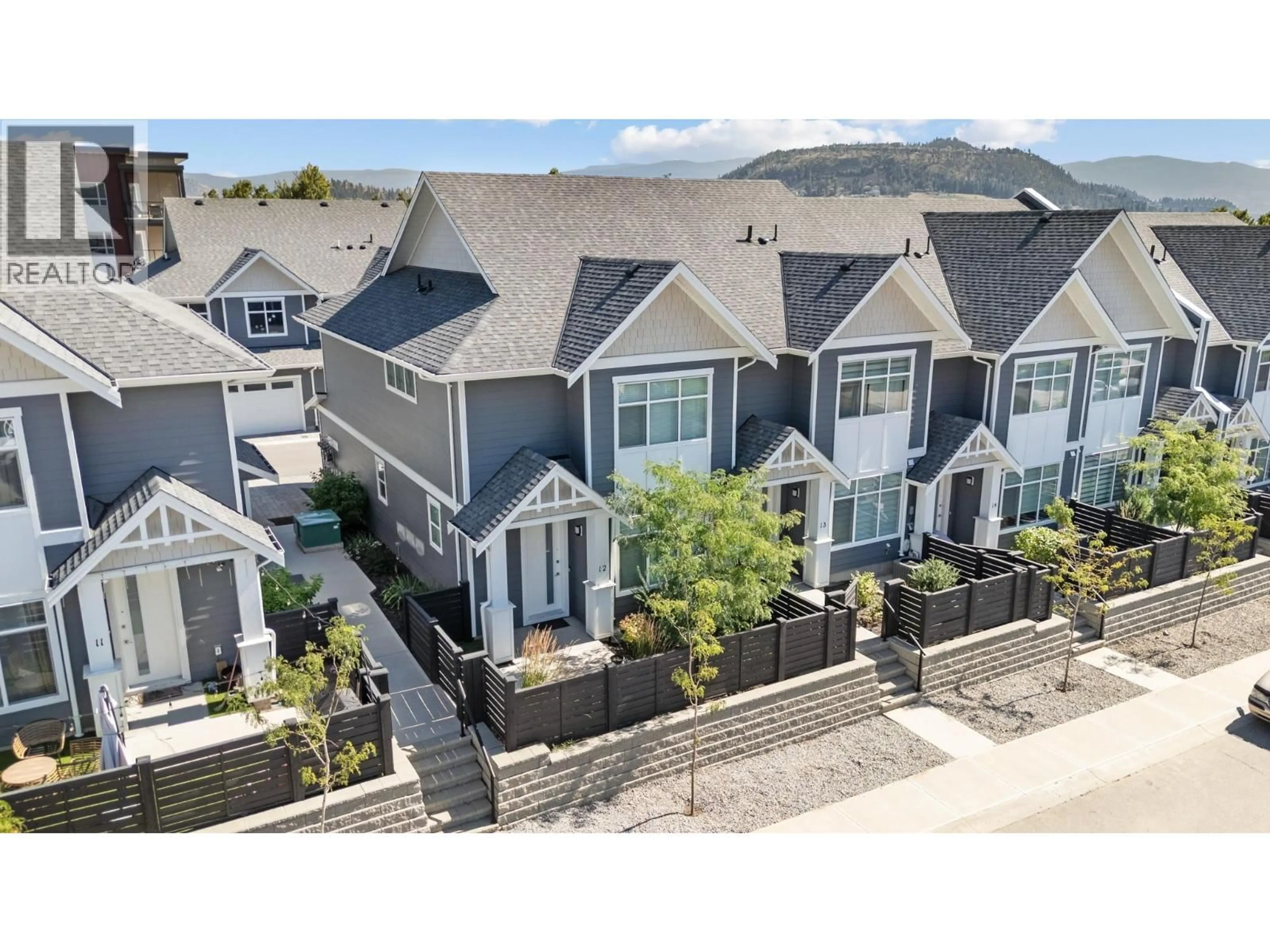 A pic from outside/outdoor area/front of a property/back of a property/a pic from drone, street for 12 - 115 WYNDHAM CRESCENT, Kelowna British Columbia V1V1Z2