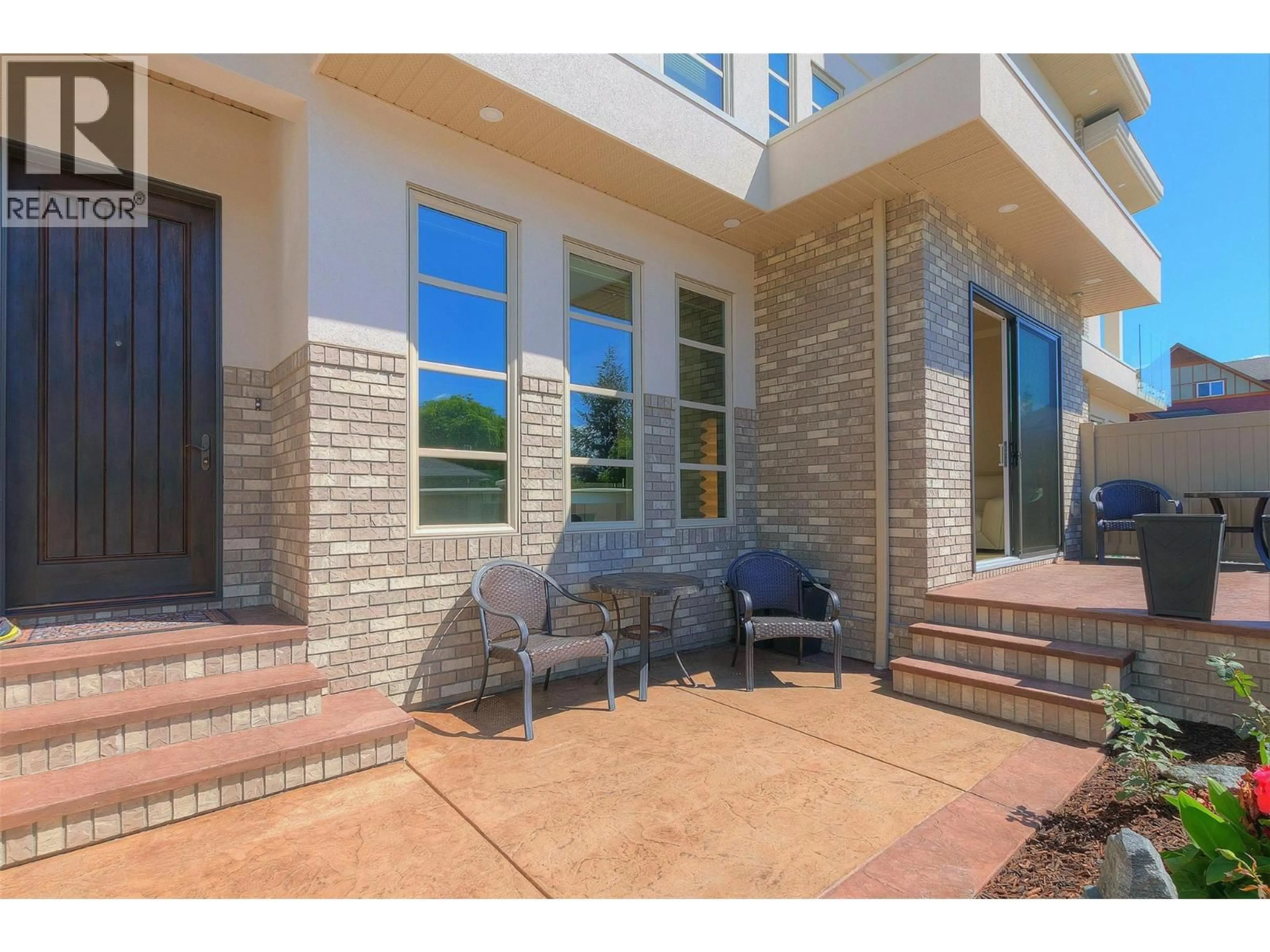 Home with brick exterior material, street for 2571 ABBOTT STREET, Kelowna British Columbia V1Y9T9