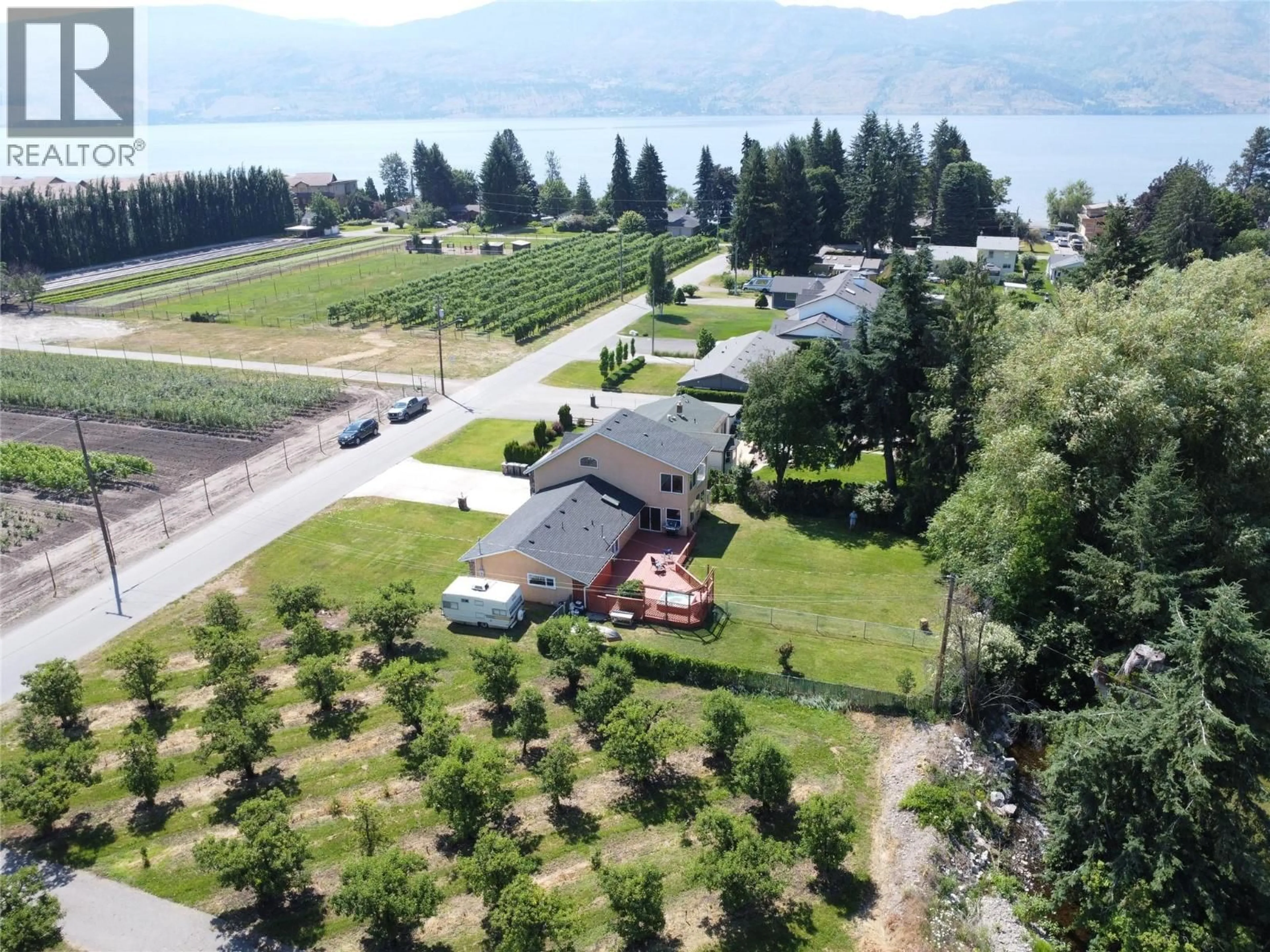 A pic from outside/outdoor area/front of a property/back of a property/a pic from drone, water/lake/river/ocean view for 3982 HITCHNER ROAD, West Kelowna British Columbia V4T2C9