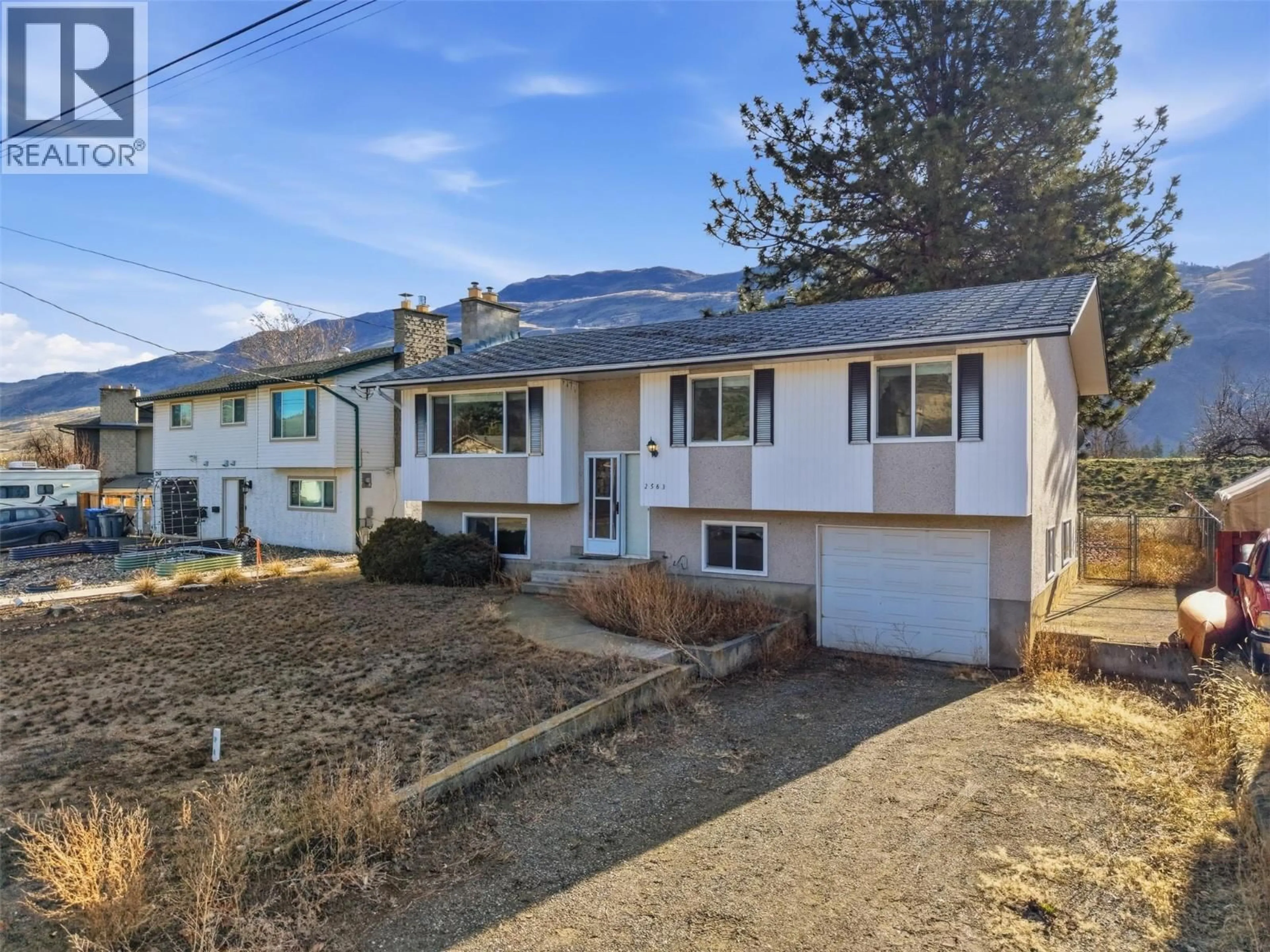 A pic from outside/outdoor area/front of a property/back of a property/a pic from drone, street for 2563 SANDALWOOD DRIVE, Kamloops British Columbia V2B6V3