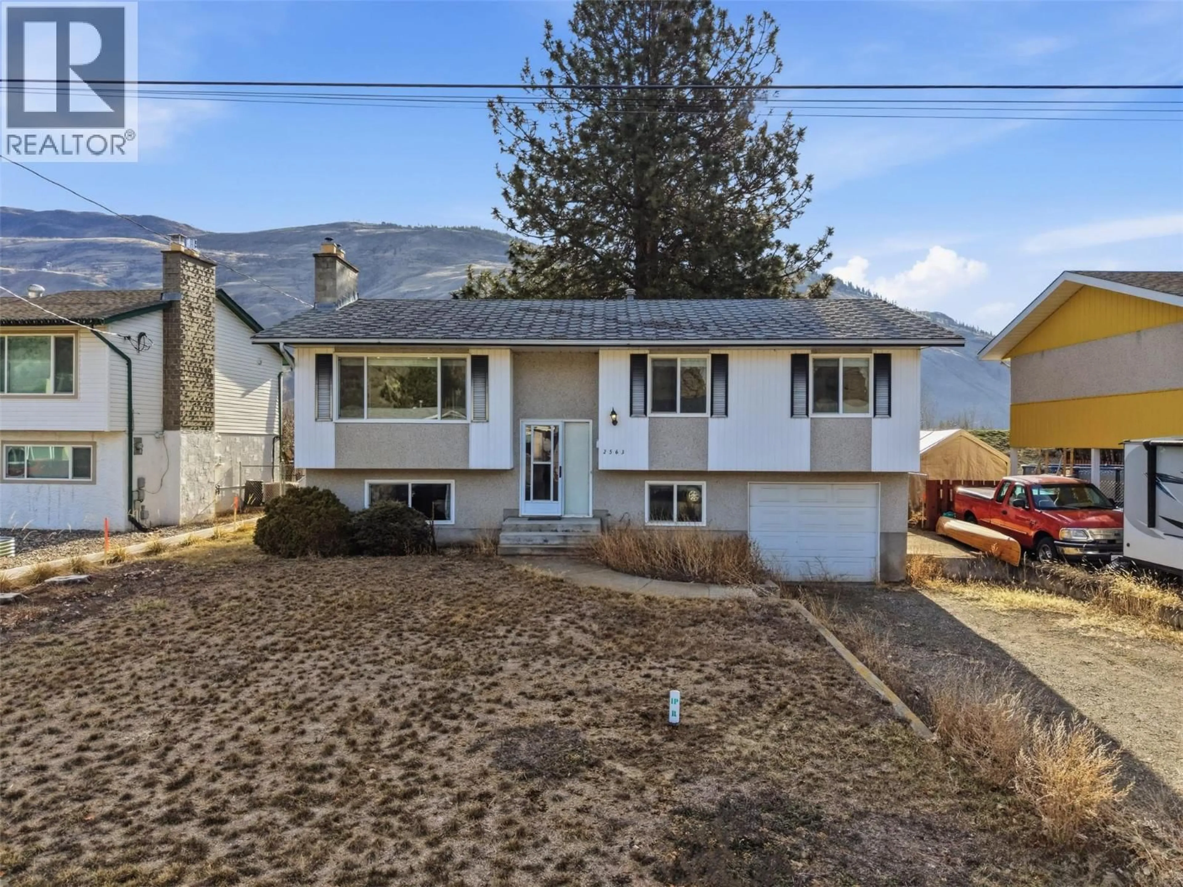 Home with vinyl exterior material, mountain view for 2563 SANDALWOOD DRIVE, Kamloops British Columbia V2B6V3