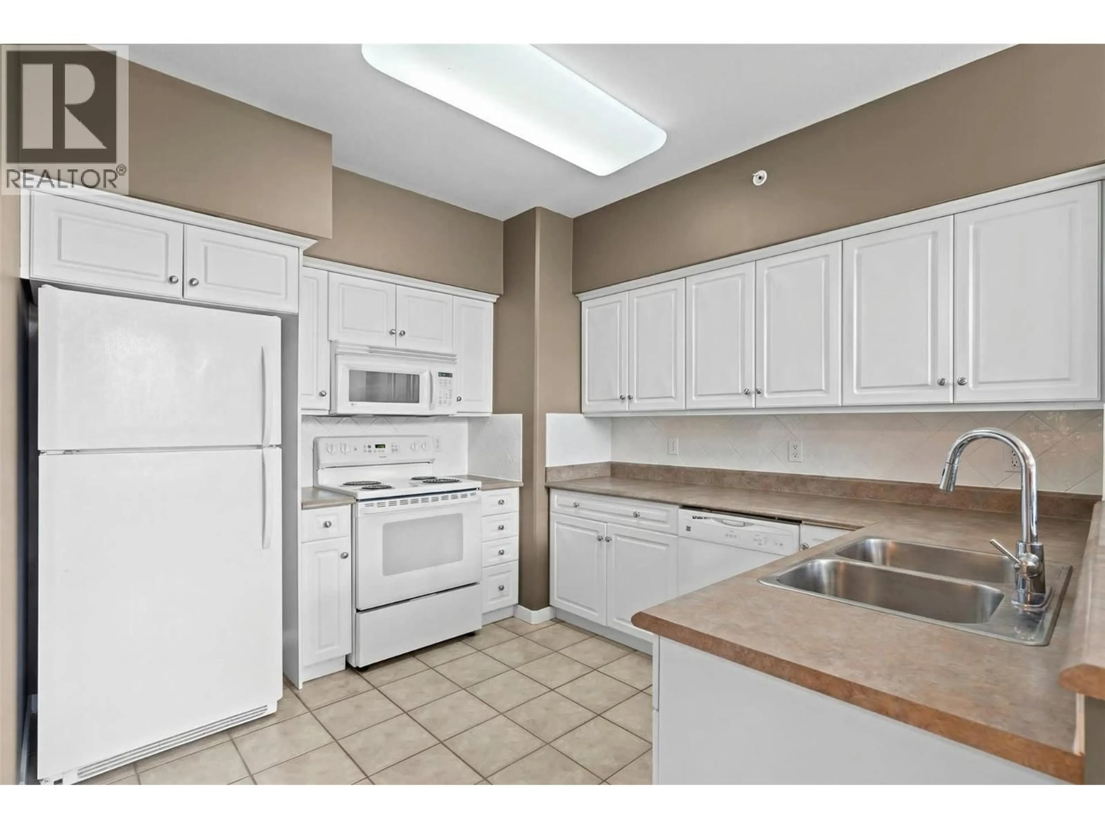 Standard kitchen, unknown for 405 - 688 LEQUIME ROAD, Kelowna British Columbia V1W1A4
