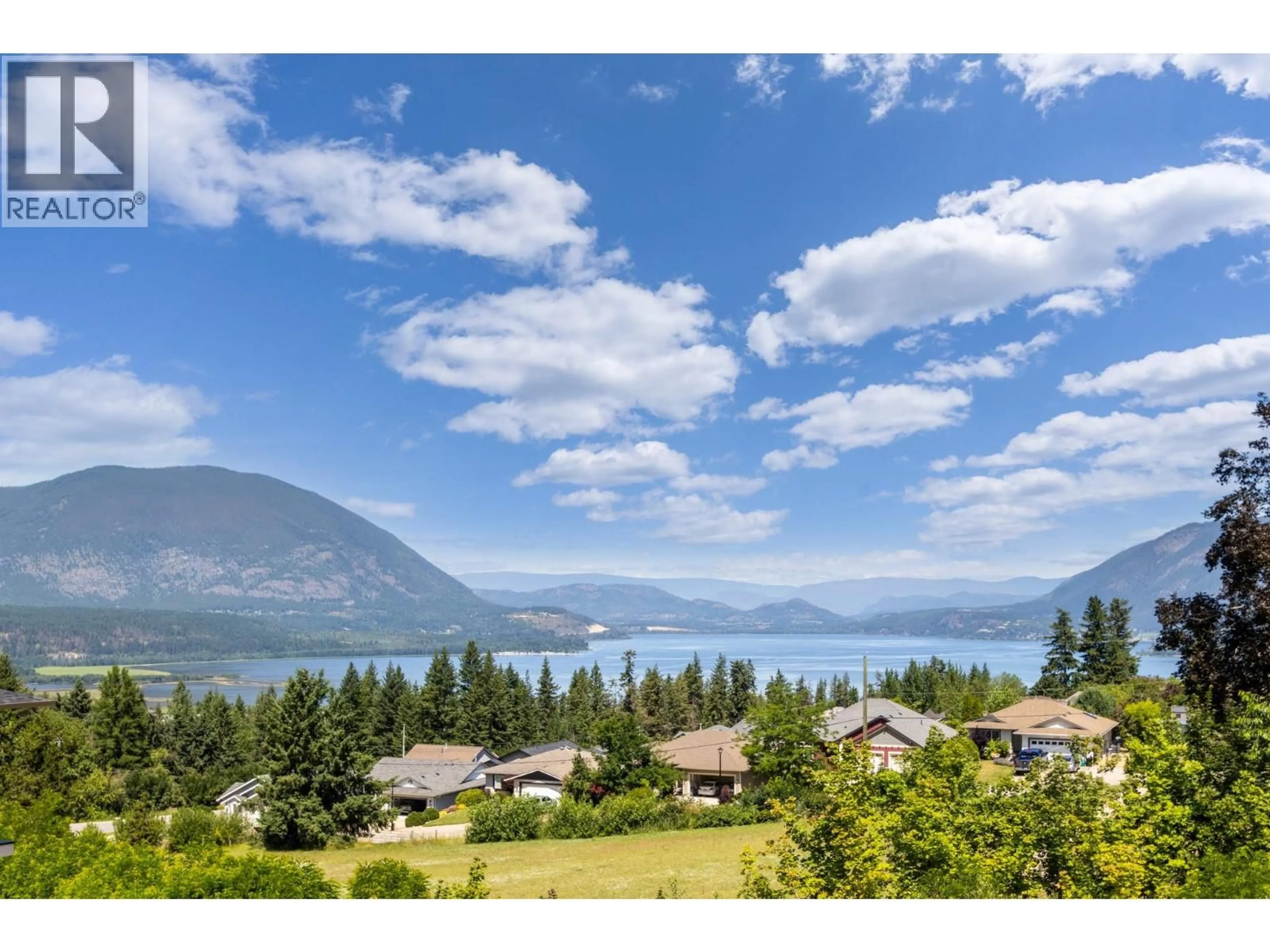 A pic from outside/outdoor area/front of a property/back of a property/a pic from drone, water/lake/river/ocean view for 1160 16 AVENUE SOUTHEAST, Salmon Arm British Columbia V1E2R5