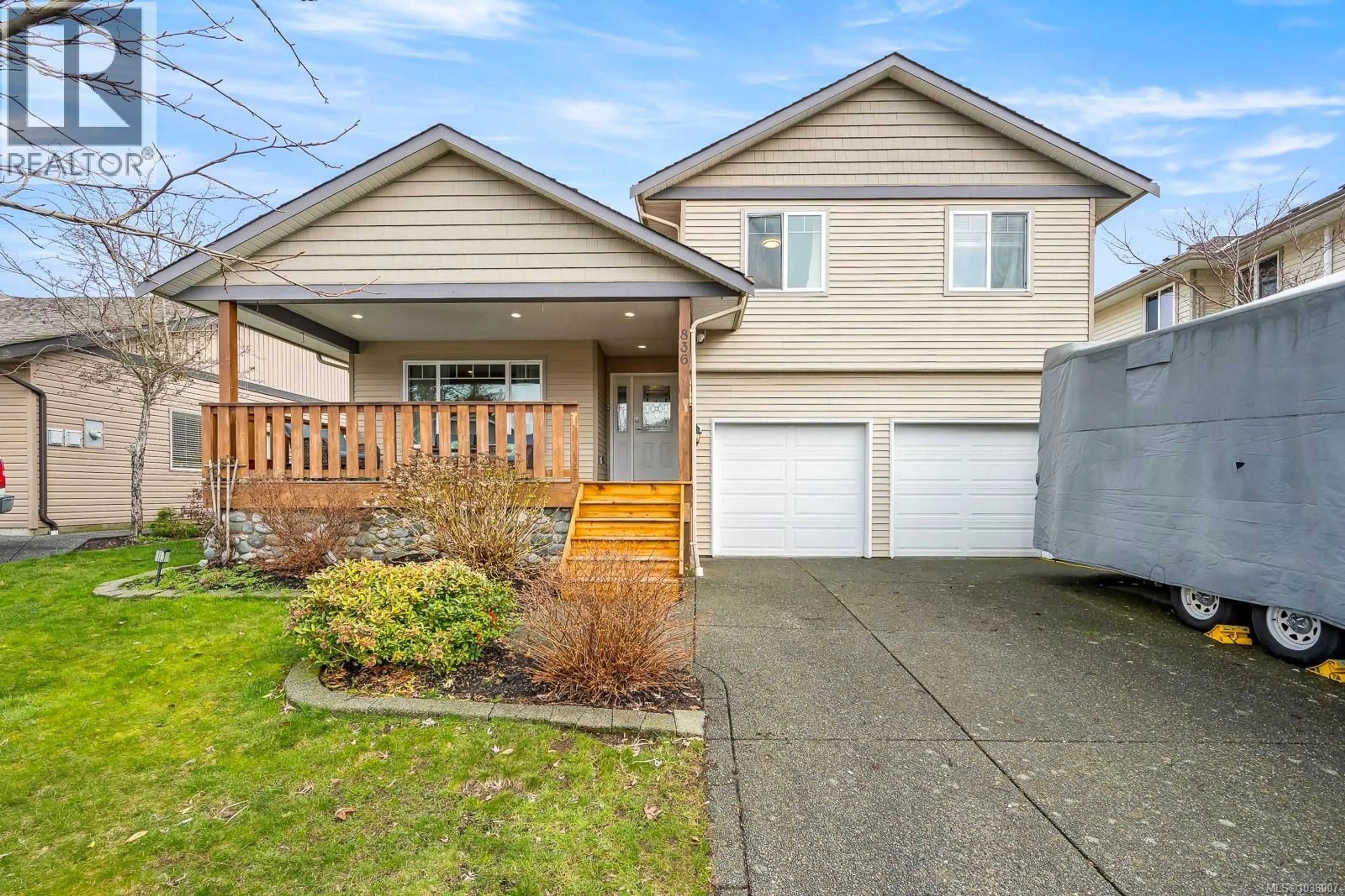 Home with vinyl exterior material, street for 836 TRACKER PLACE, Comox British Columbia V9M4E8