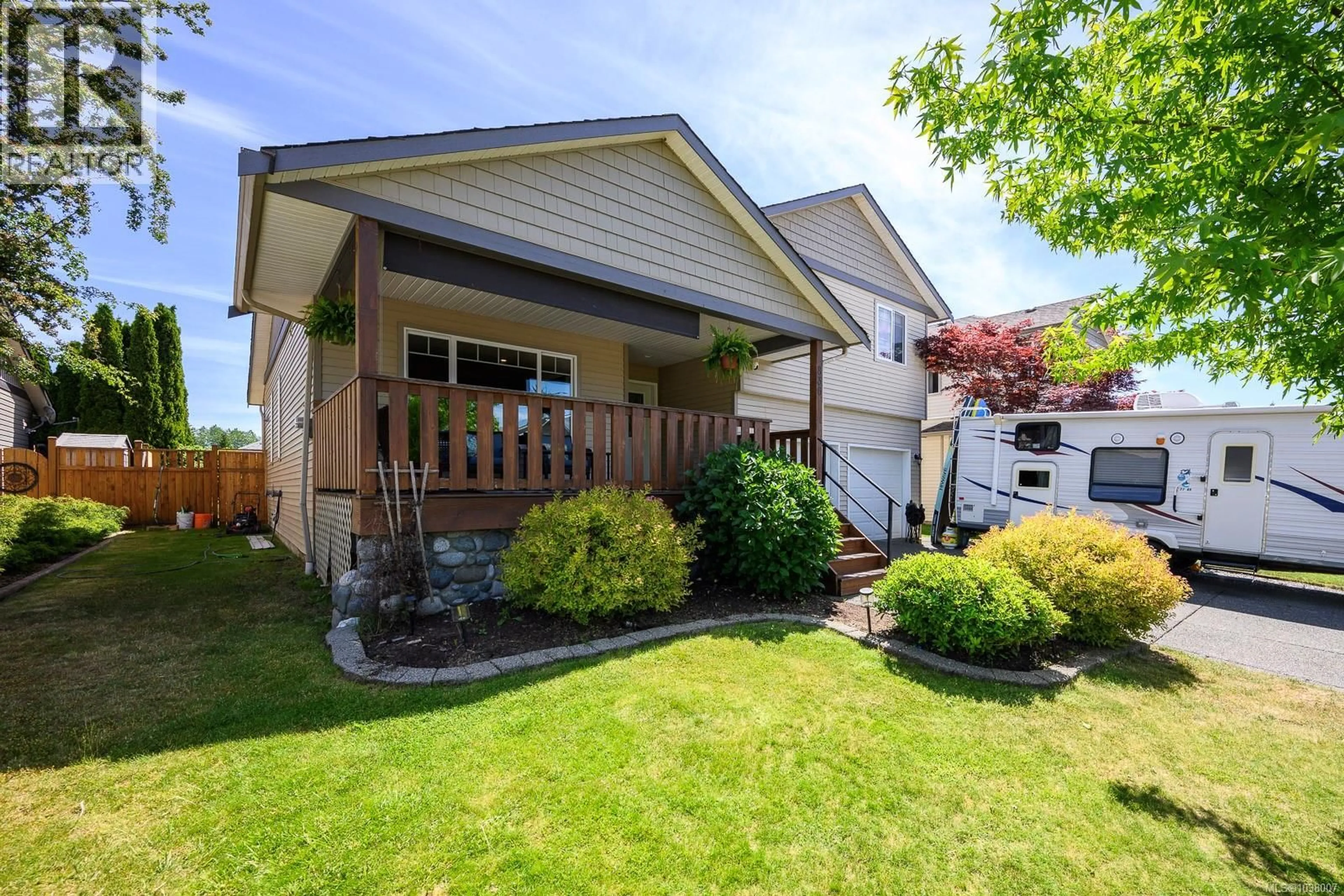 Home with vinyl exterior material, street for 836 TRACKER PLACE, Comox British Columbia V9M4E8