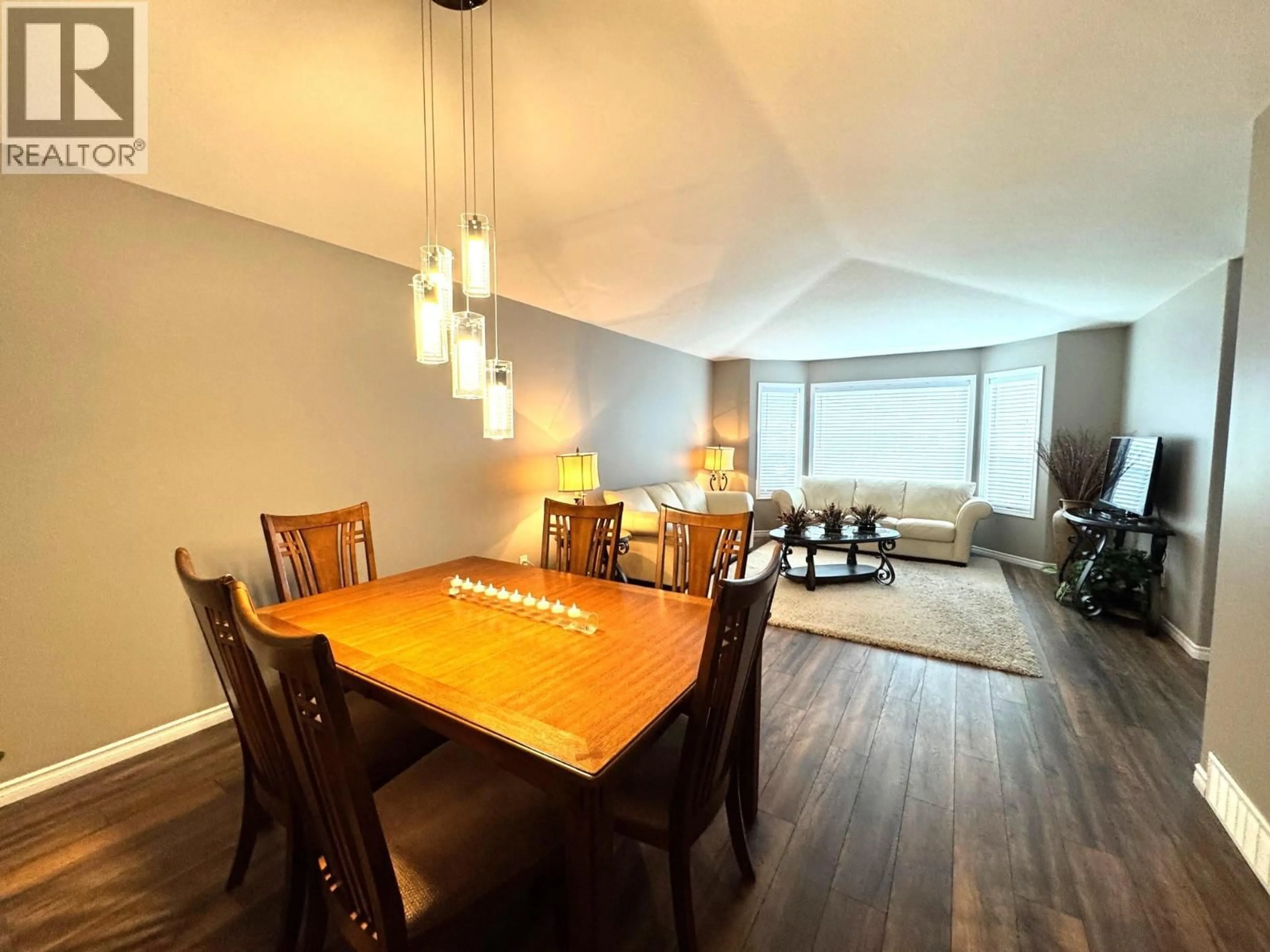 Dining room, wood/laminate floor for 114 - 2330 BUTT ROAD, Westbank British Columbia V4T2L3