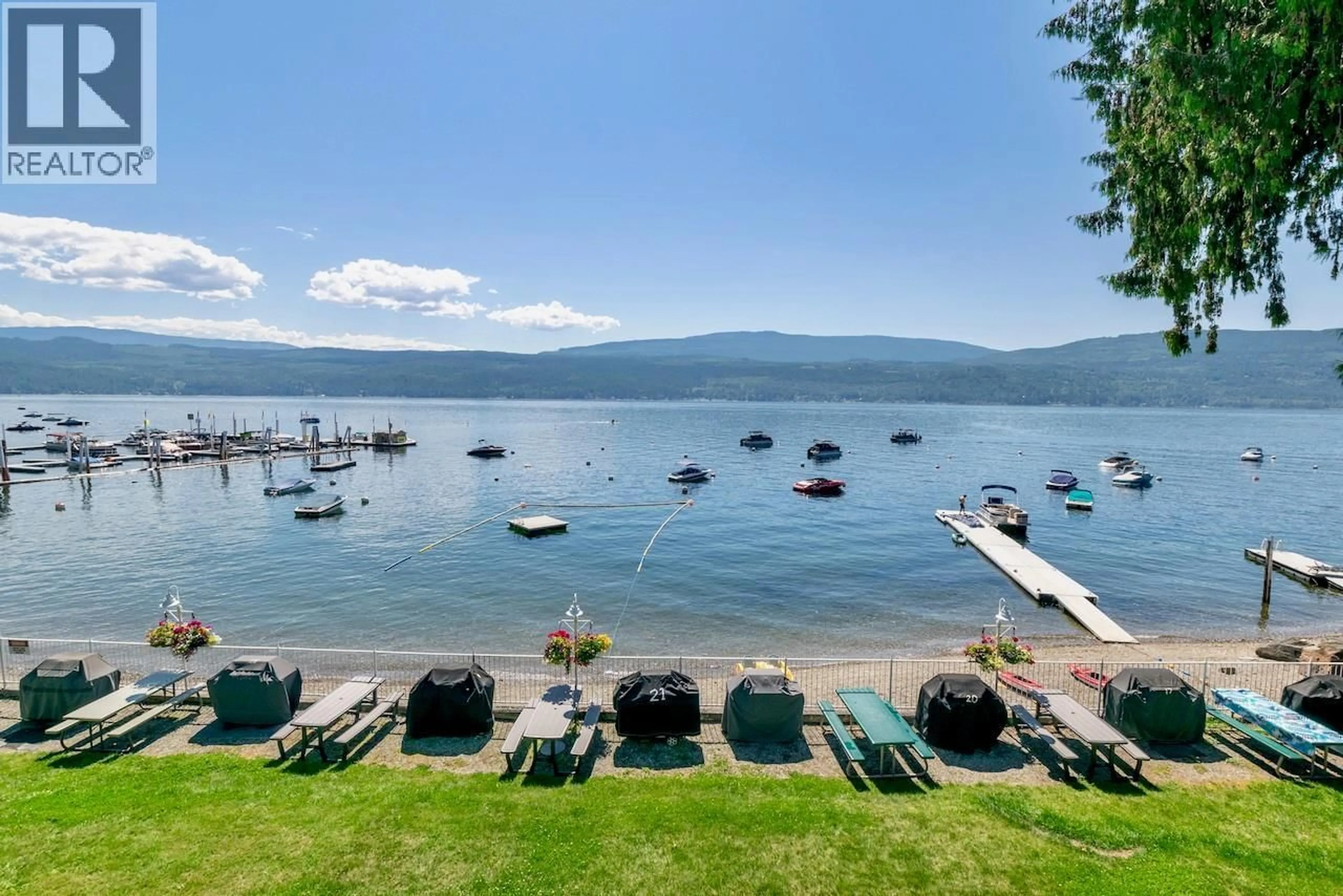 A pic from outside/outdoor area/front of a property/back of a property/a pic from drone, water/lake/river/ocean view for 16 - 7732 SQUILAX-ANGLEMONT ROAD, Anglemont British Columbia V0E1M8