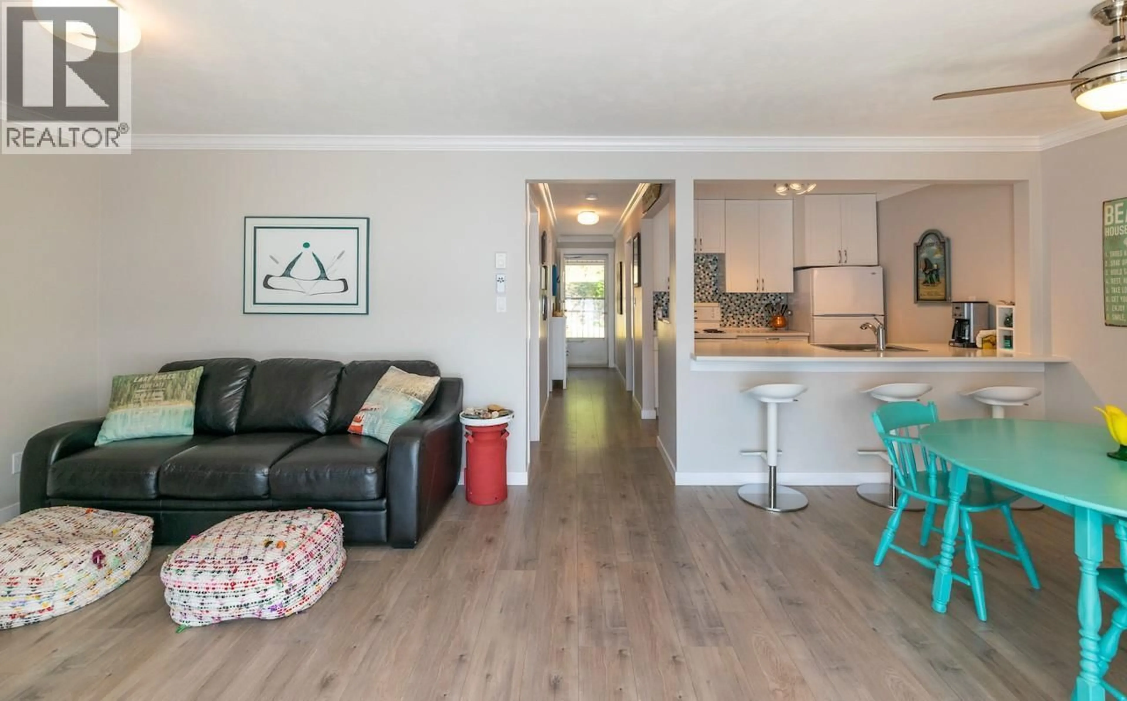 Living room with furniture, wood/laminate floor for 16 - 7732 SQUILAX-ANGLEMONT ROAD, Anglemont British Columbia V0E1M8