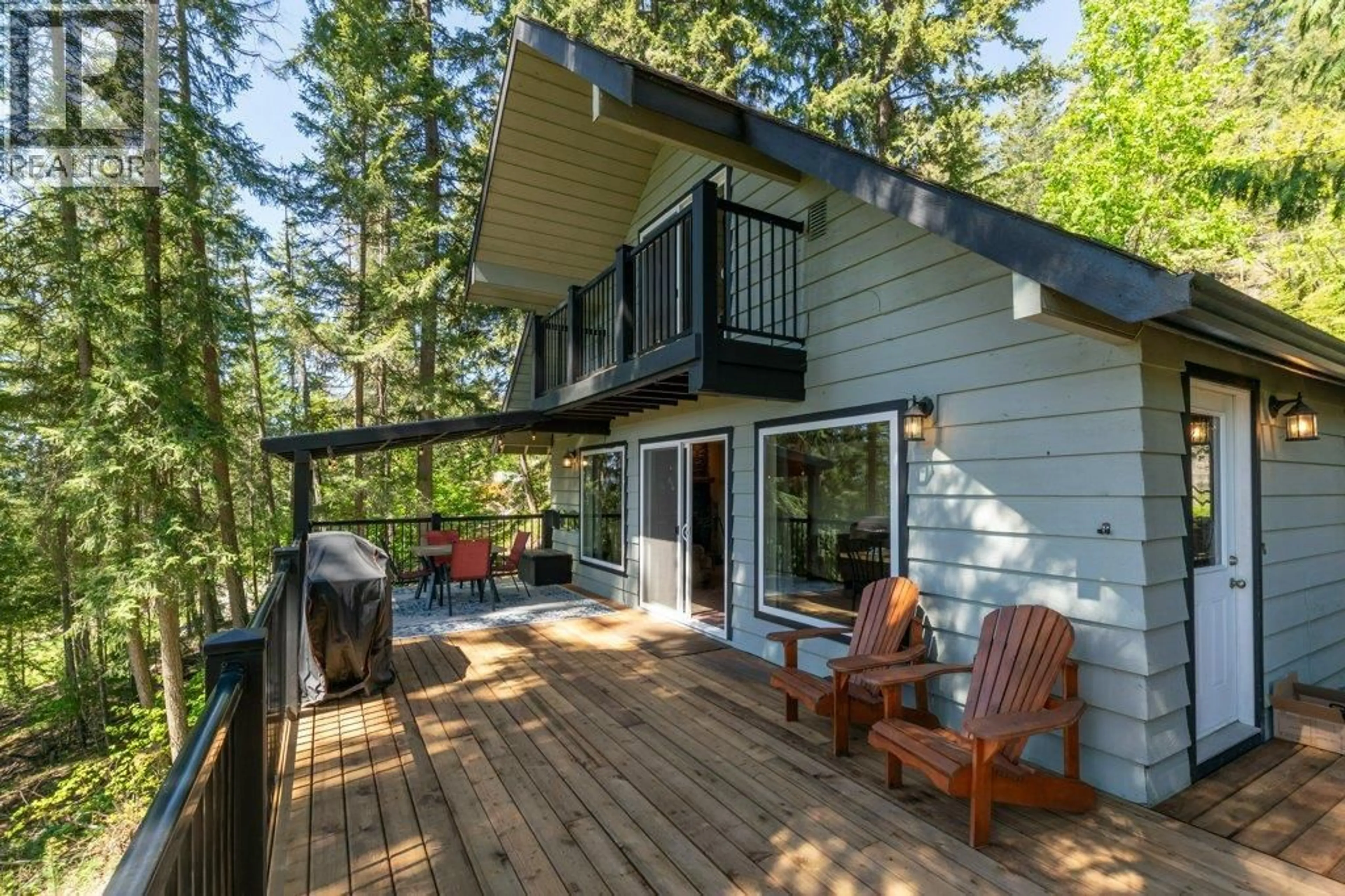 Patio, forest/trees view for 7730 COLUMBIA DRIVE, Anglemont British Columbia V0E1M8