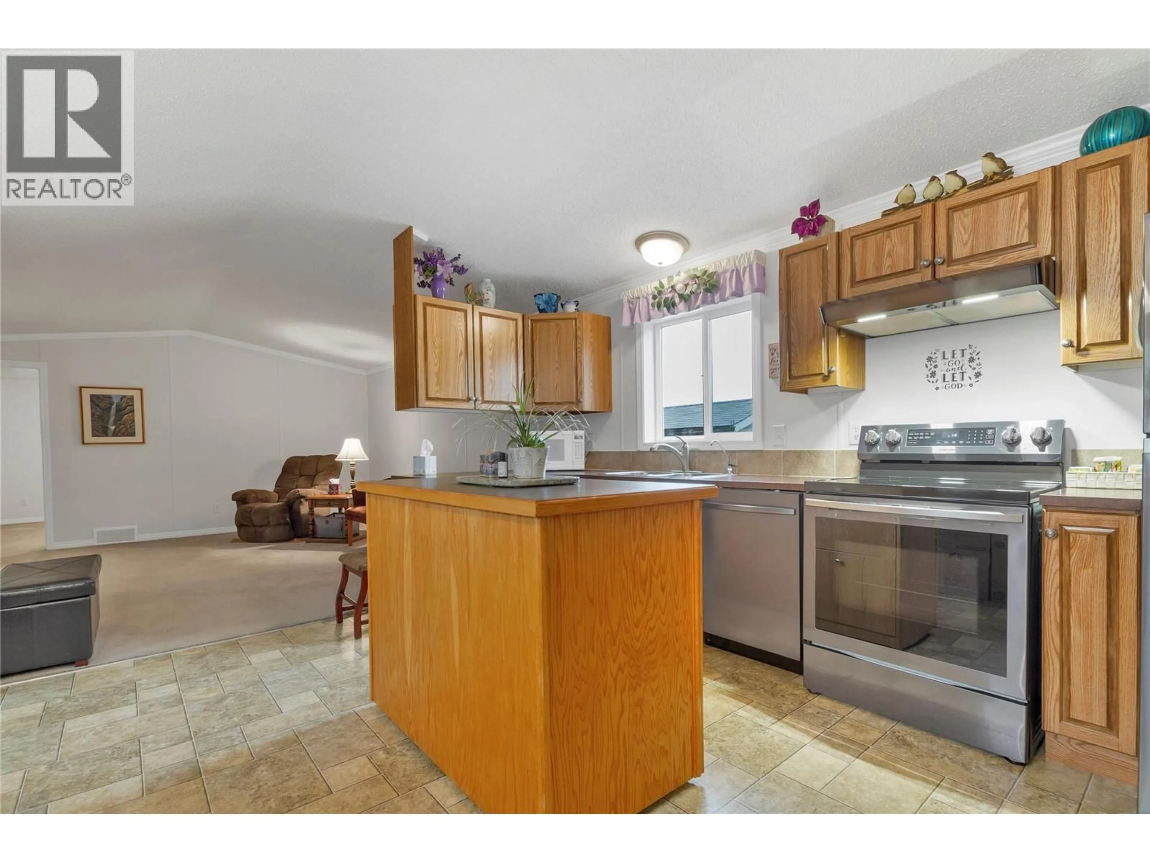 Open concept kitchen, unknown for 107 - 9510 97N HIGHWAY, Vernon British Columbia V1H1R8