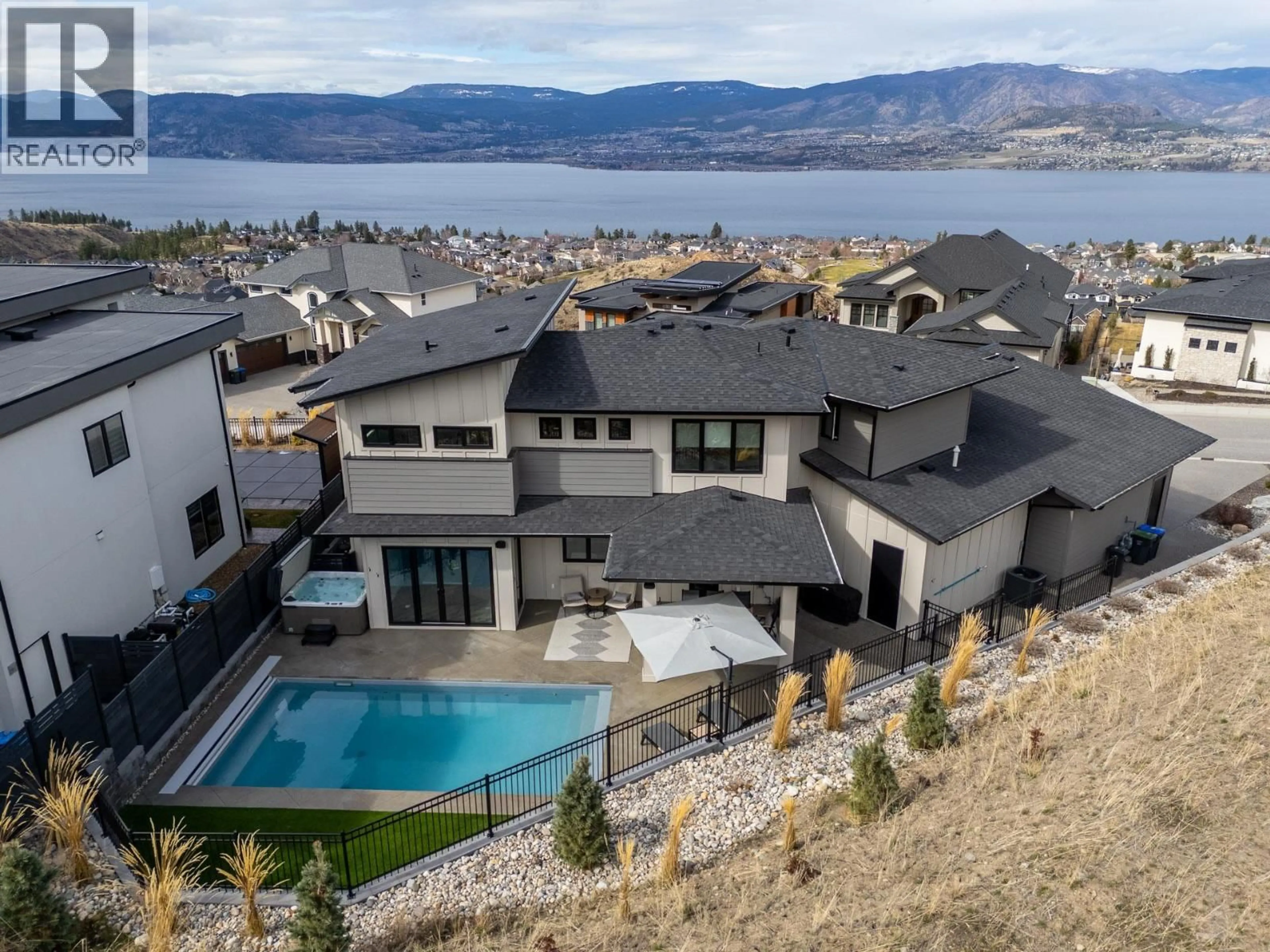 A pic from outside/outdoor area/front of a property/back of a property/a pic from drone, water/lake/river/ocean view for 491 TRESTLE RIDGE DRIVE, Kelowna British Columbia V1W5M3