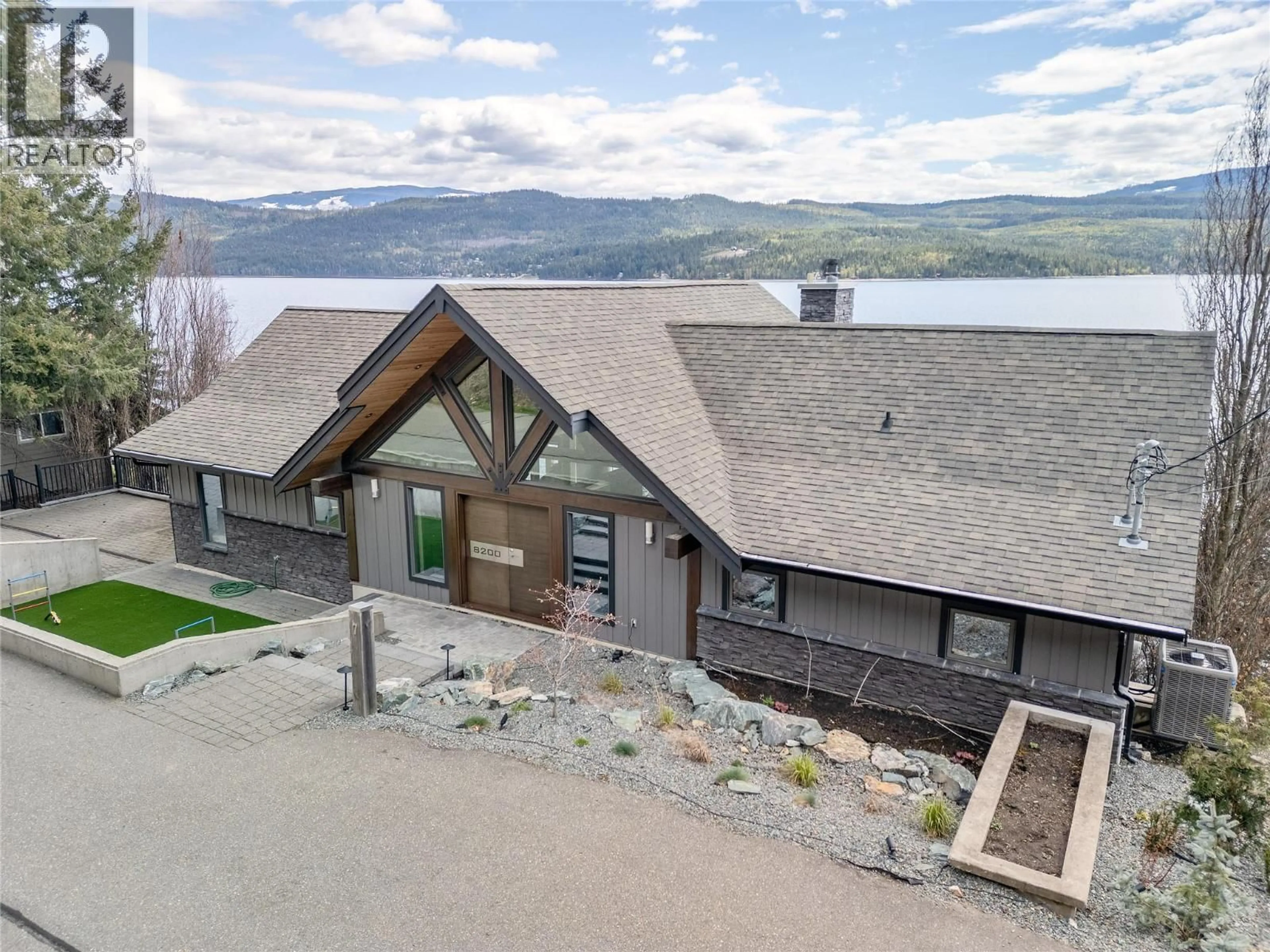 A pic from outside/outdoor area/front of a property/back of a property/a pic from drone, water/lake/river/ocean view for 7 - 8200 SQUILAX ANGLEMONT ROAD, Anglemont British Columbia V0E1M8