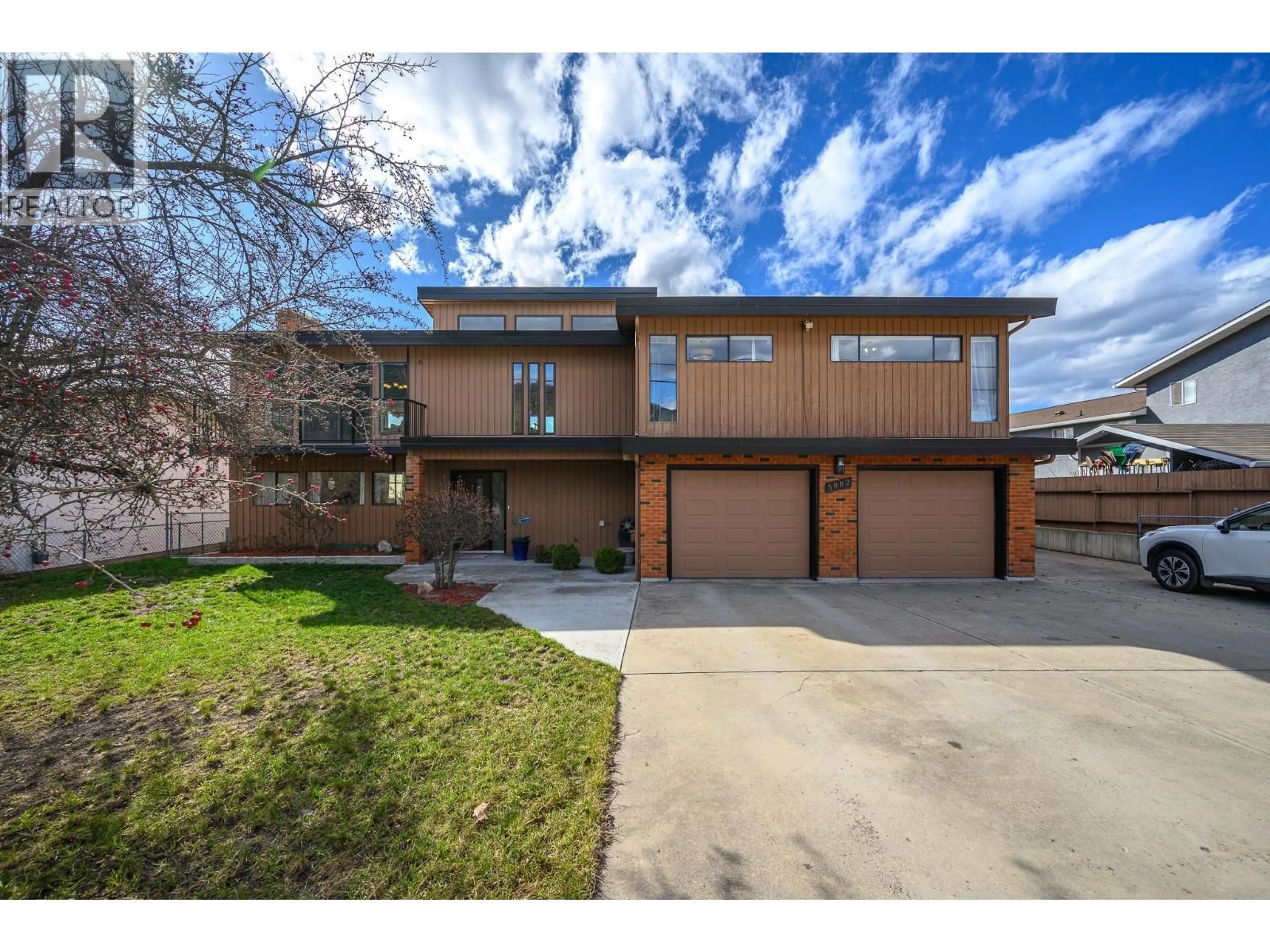 Home with brick exterior material, street for 5882 L&A ROAD, Vernon British Columbia V1B3P9