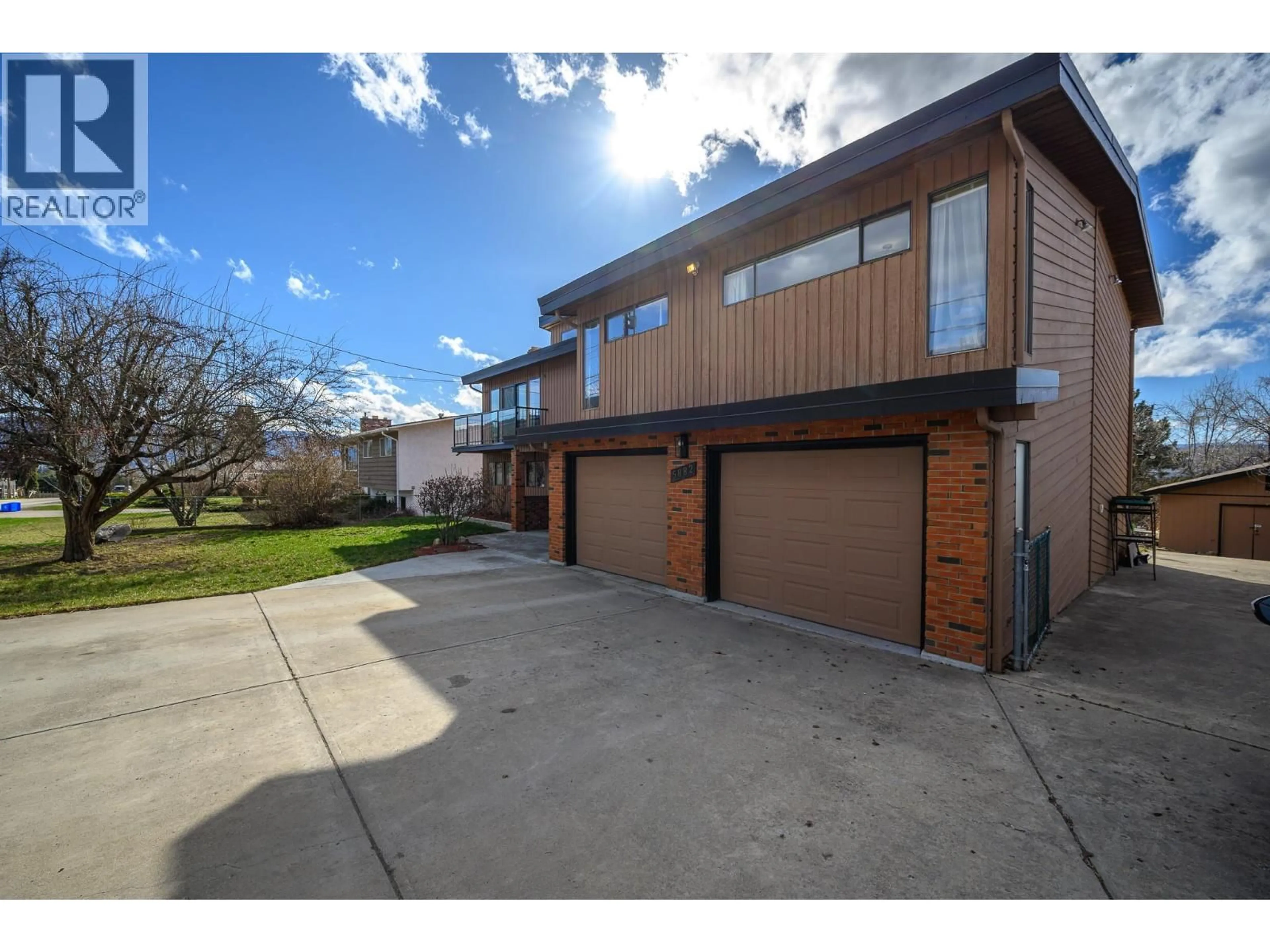 Home with brick exterior material, street for 5882 L&A ROAD, Vernon British Columbia V1B3P9