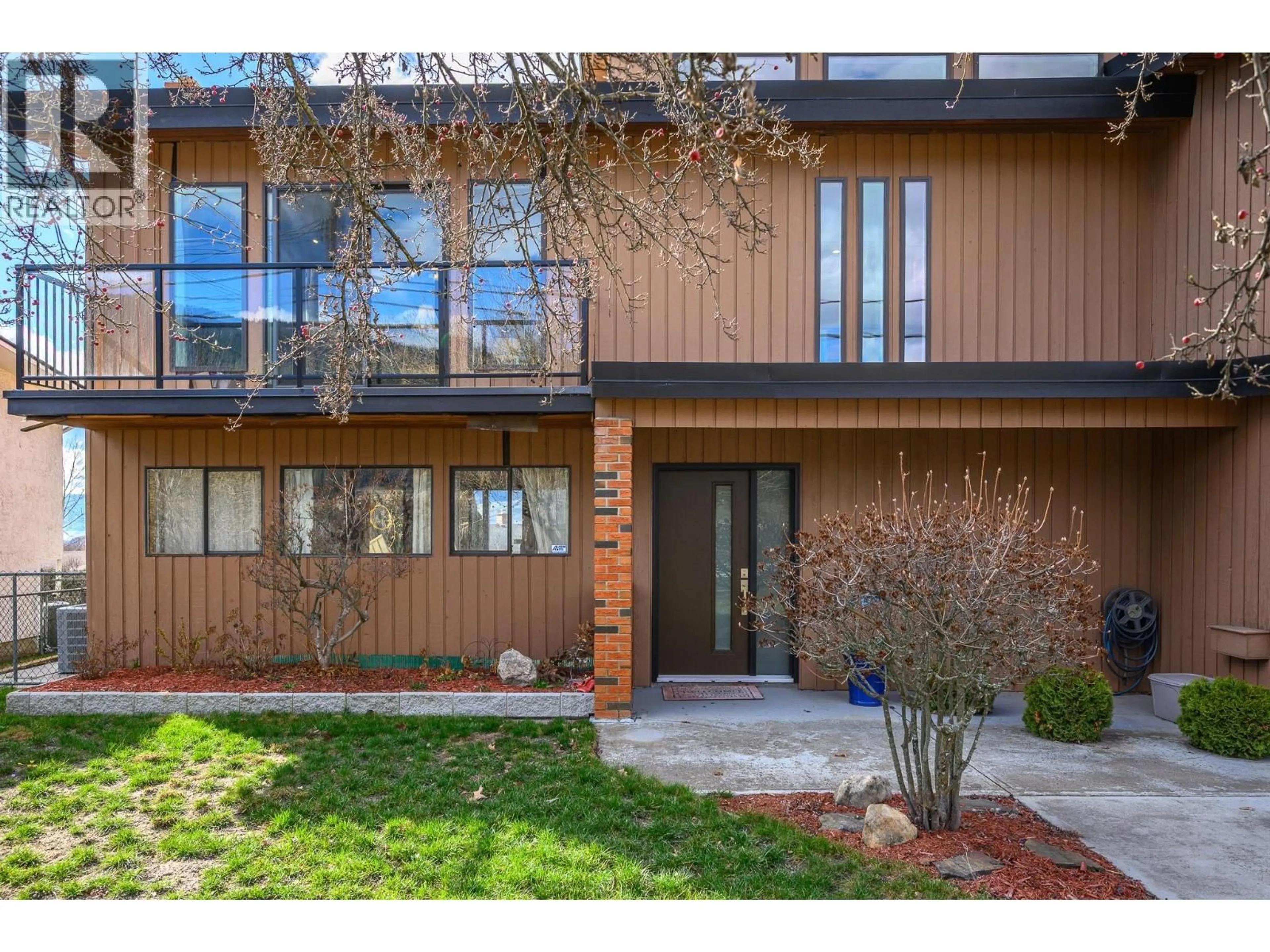 Home with brick exterior material, street for 5882 L&A ROAD, Vernon British Columbia V1B3P9