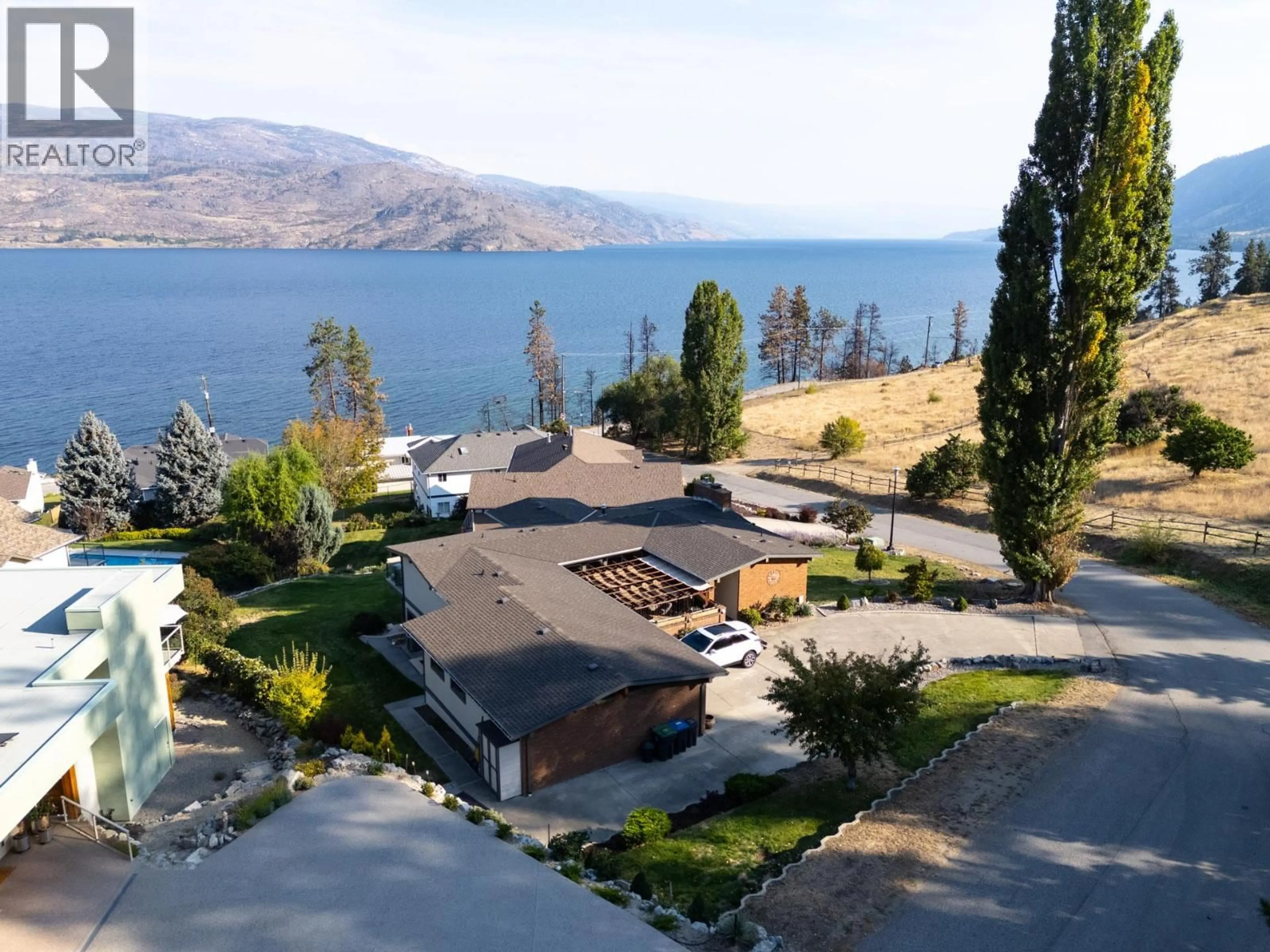 A pic from outside/outdoor area/front of a property/back of a property/a pic from drone, water/lake/river/ocean view for 6555 SHERBURN ROAD, Peachland British Columbia V0H1X7
