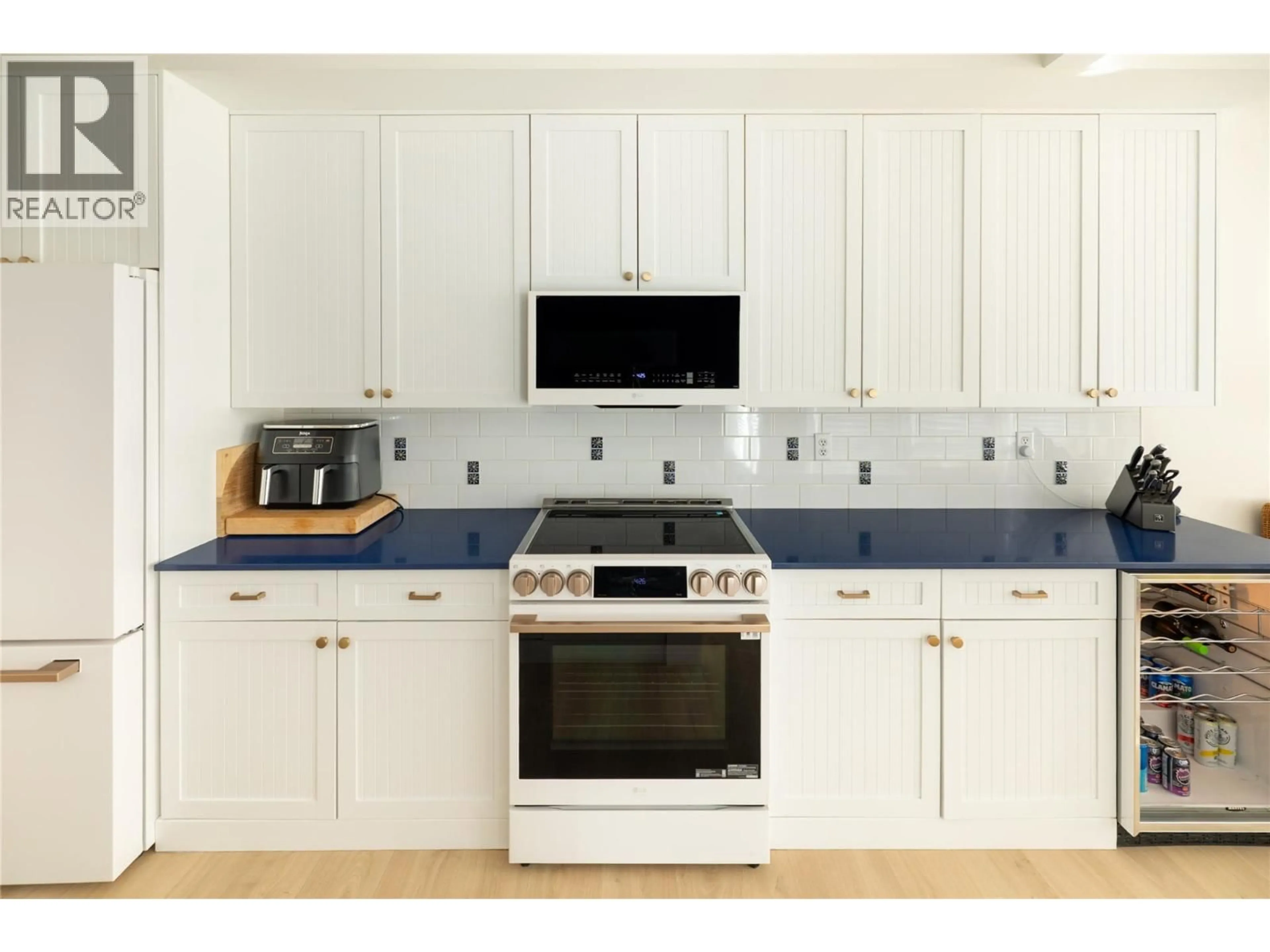 Contemporary kitchen, ceramic/tile floor for 124 - 3880 TRUSWELL ROAD, Kelowna British Columbia V1W5A2