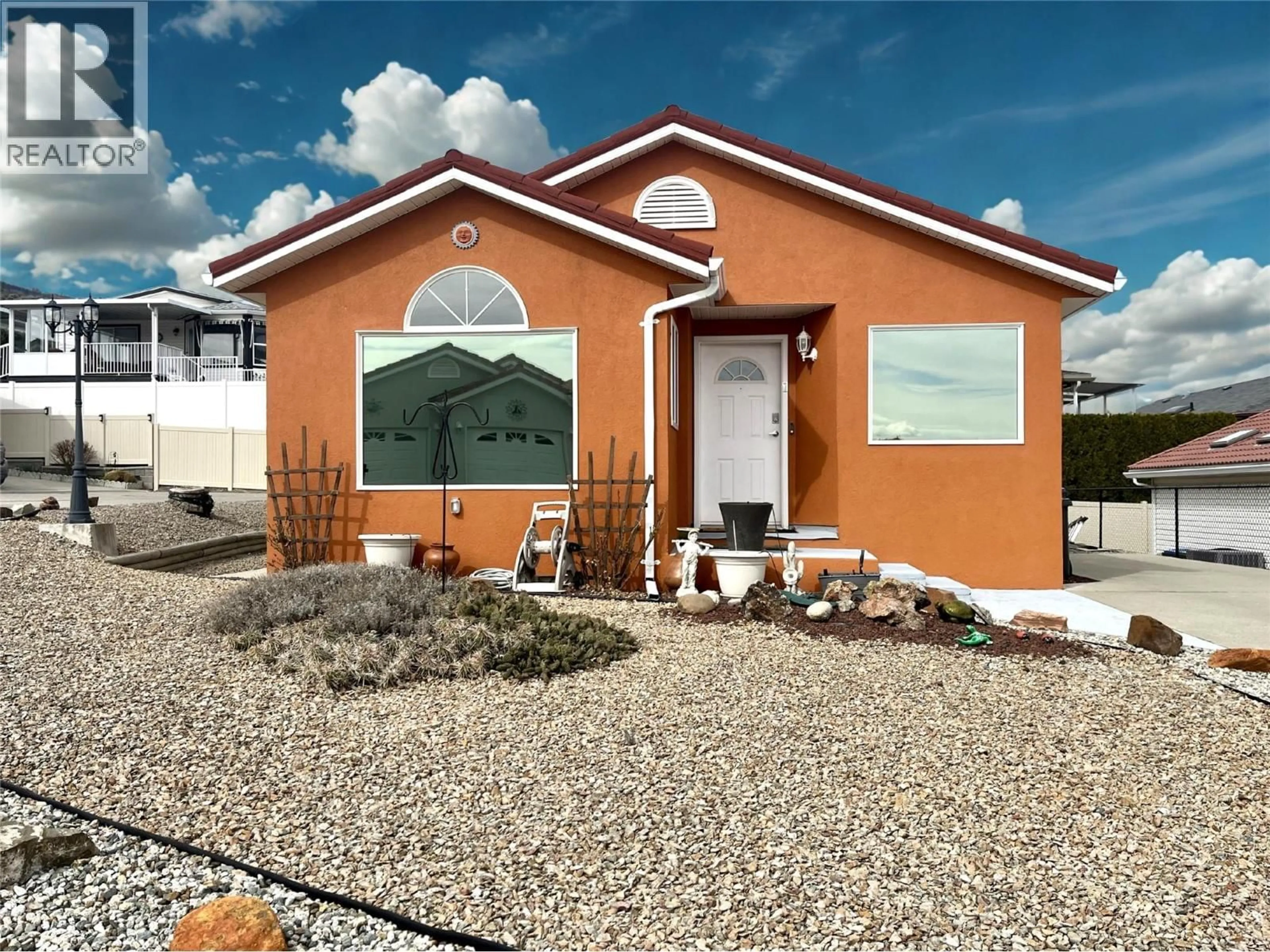 Home with vinyl exterior material, street for 1 - 9400 115TH STREET, Osoyoos British Columbia V0H1V5