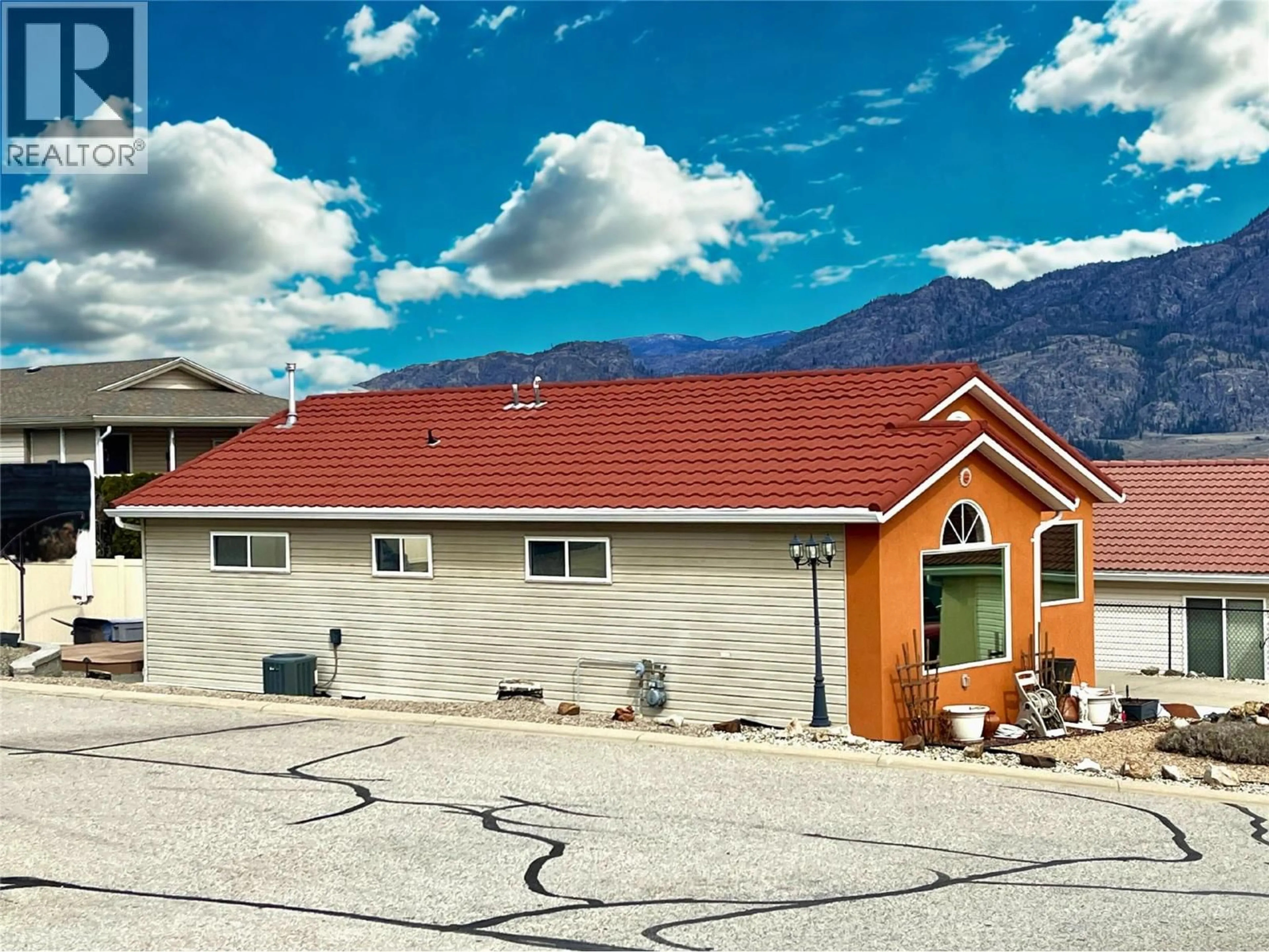 Home with vinyl exterior material, mountain view for 1 - 9400 115TH STREET, Osoyoos British Columbia V0H1V5