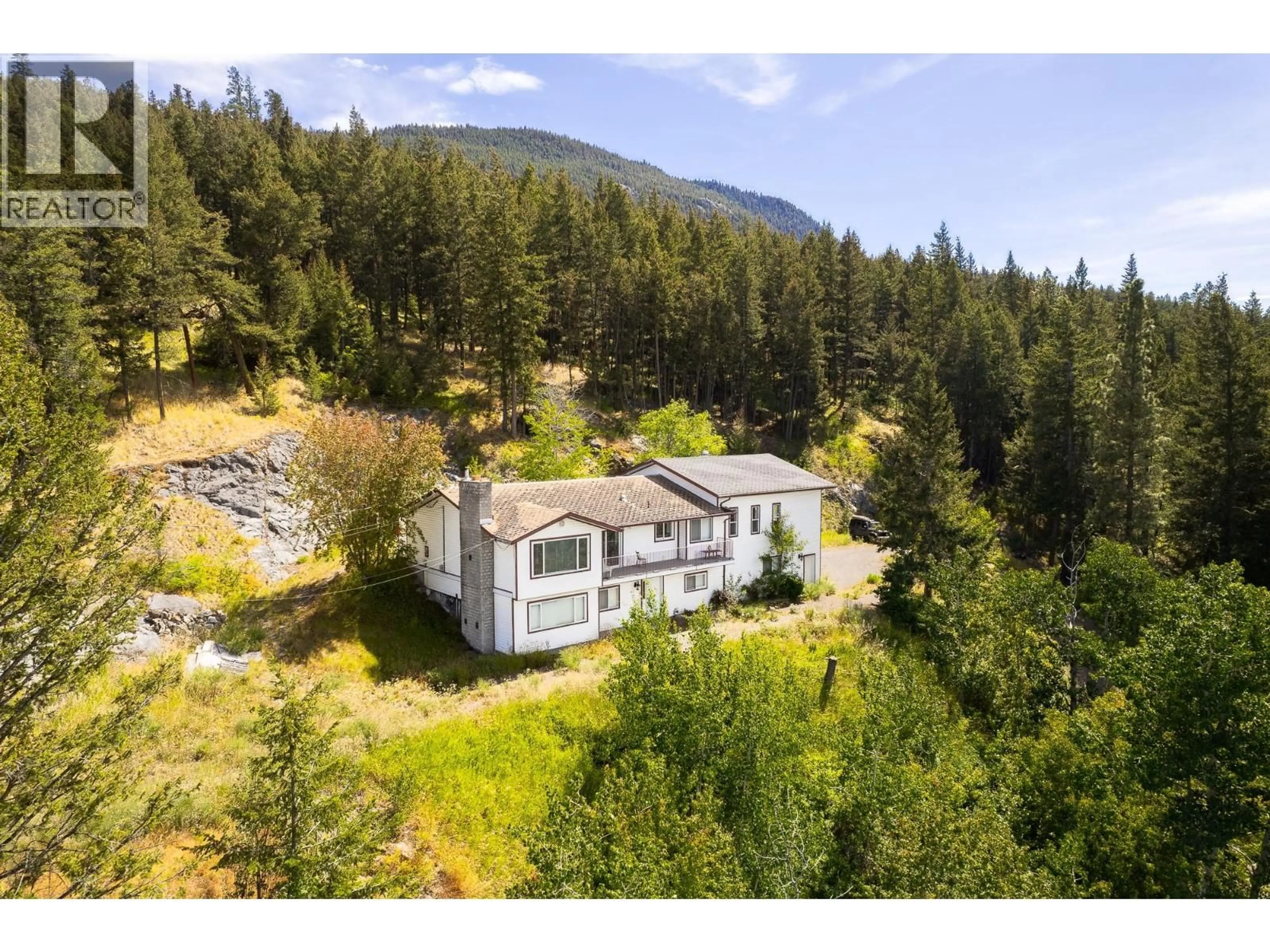 A pic from outside/outdoor area/front of a property/back of a property/a pic from drone, mountain view for 3104 PANORAMA DRIVE, Merritt British Columbia V1K1J4