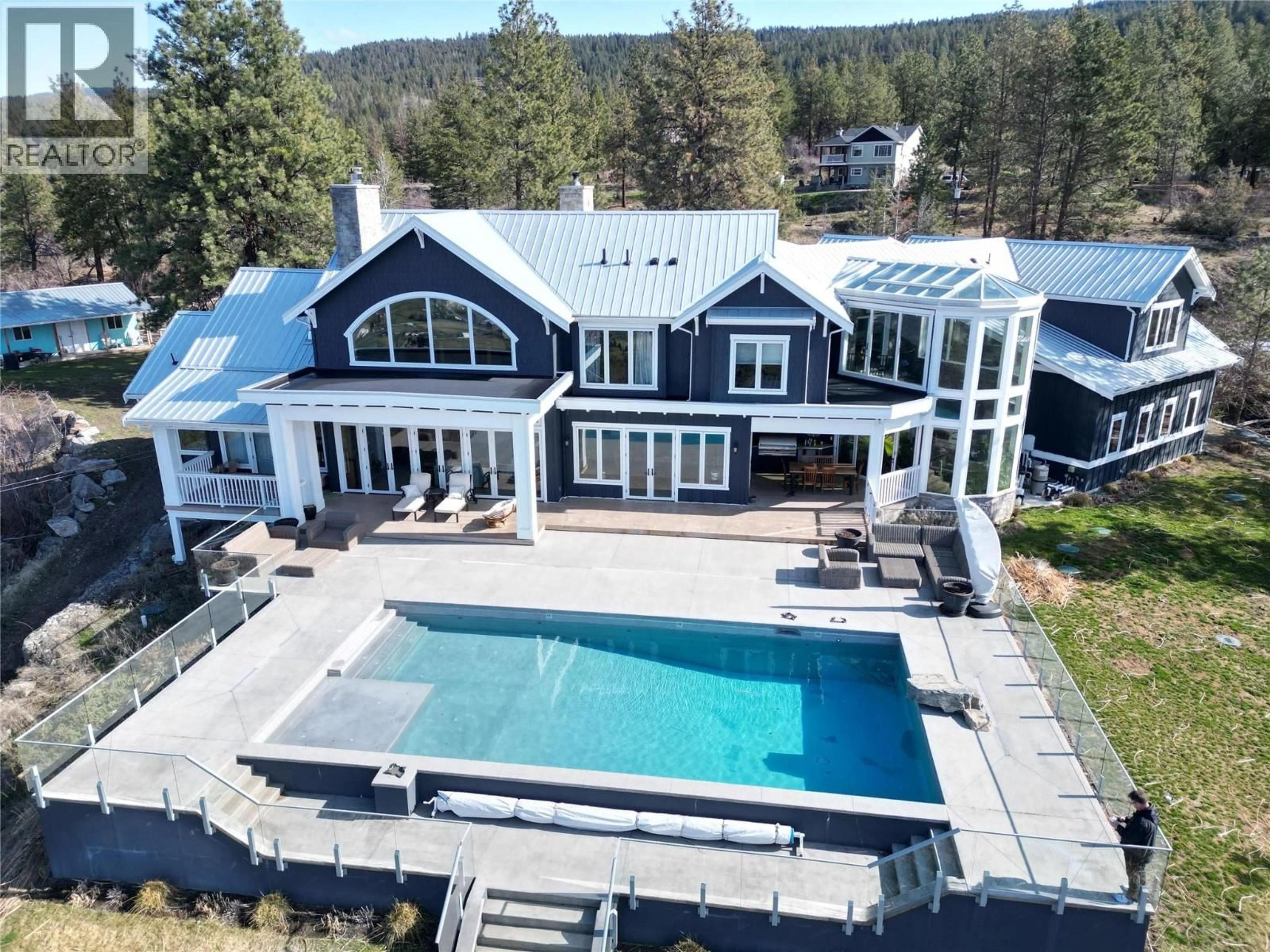 A pic from outside/outdoor area/front of a property/back of a property/a pic from drone, unknown for 5474 DEADPINE DRIVE, Kelowna British Columbia V1P1A3