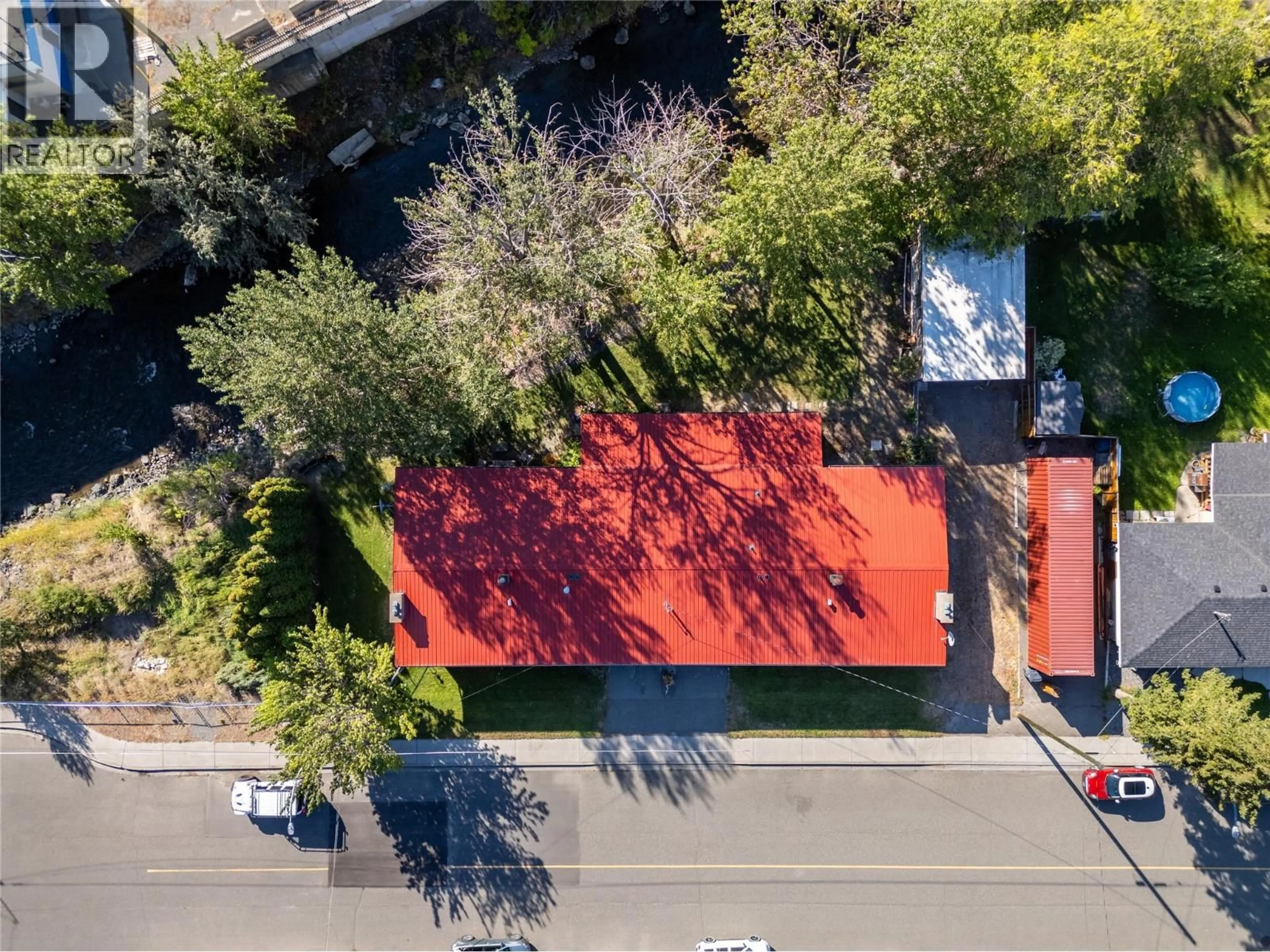 A pic from outside/outdoor area/front of a property/back of a property/a pic from drone, street for 840/842 COLLINS ROAD, Cache Creek British Columbia V0K1H0