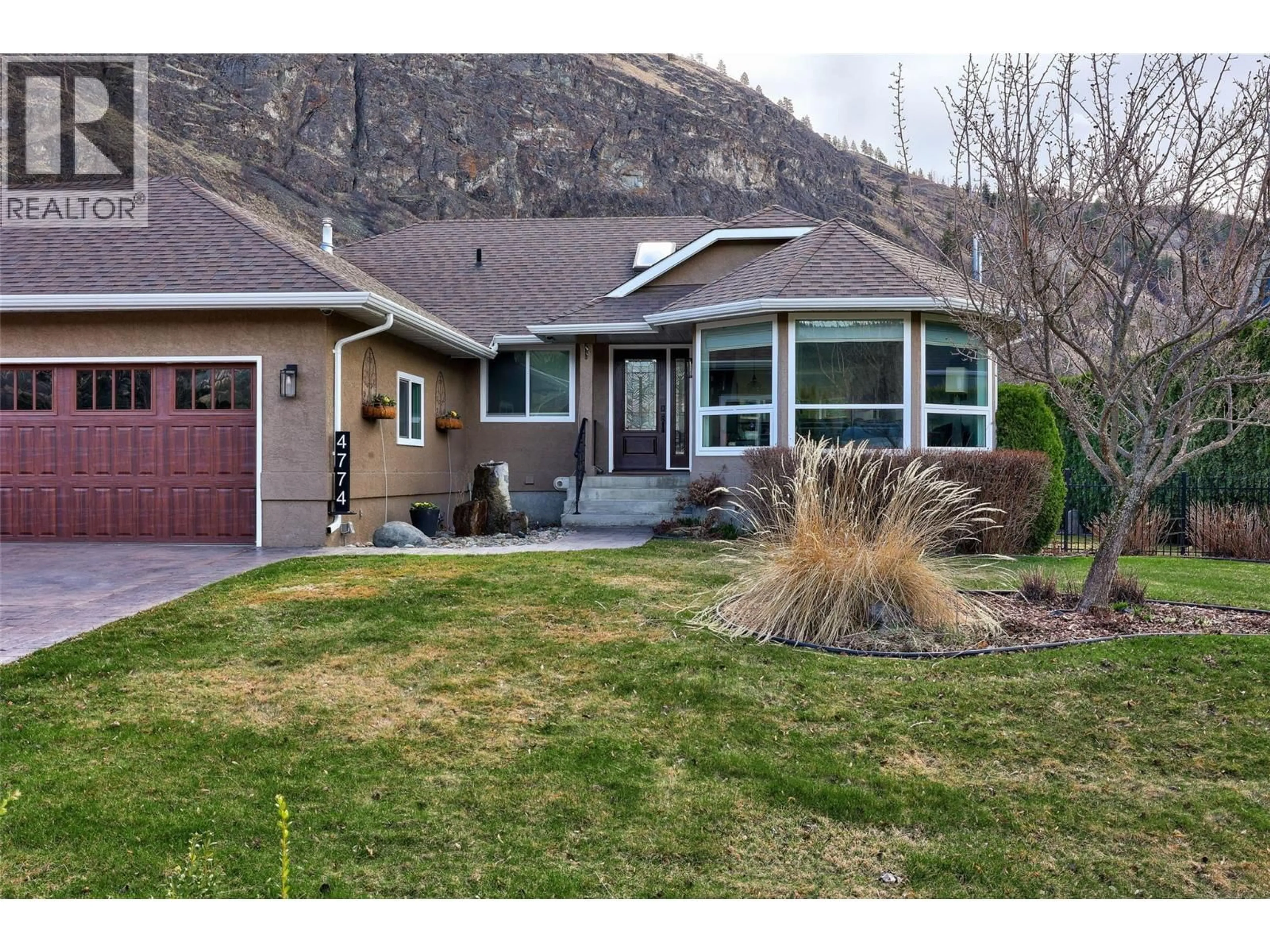 Home with vinyl exterior material, street for 4774 CAMMERAY DRIVE, Kamloops British Columbia V2H1N5