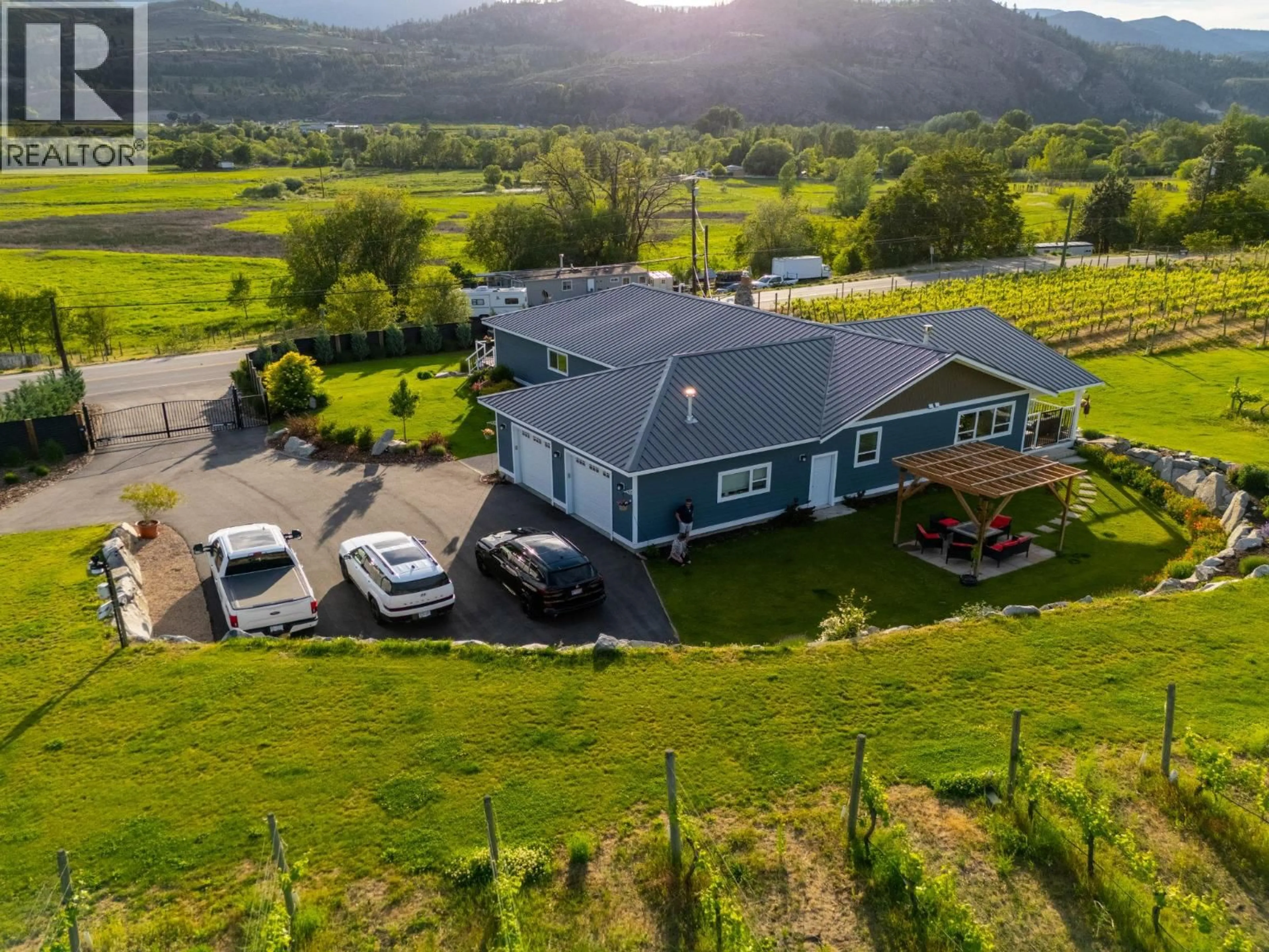 A pic from outside/outdoor area/front of a property/back of a property/a pic from drone, mountain view for 7207 TUCELNUIT DRIVE, Oliver British Columbia V0H1T2